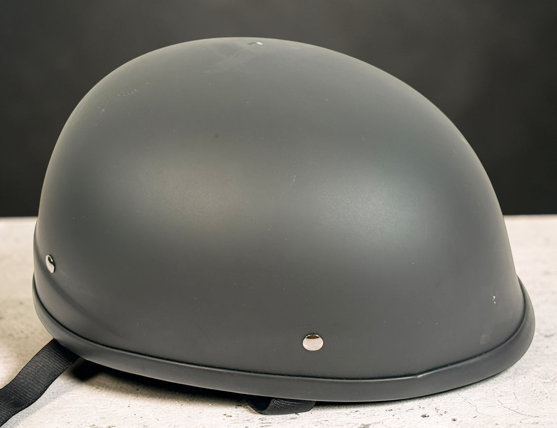 X-Terminator classic matte black motorcycle half helmet size XS with padded liner and quick release strap. Lightweight German style cruiser helmet.