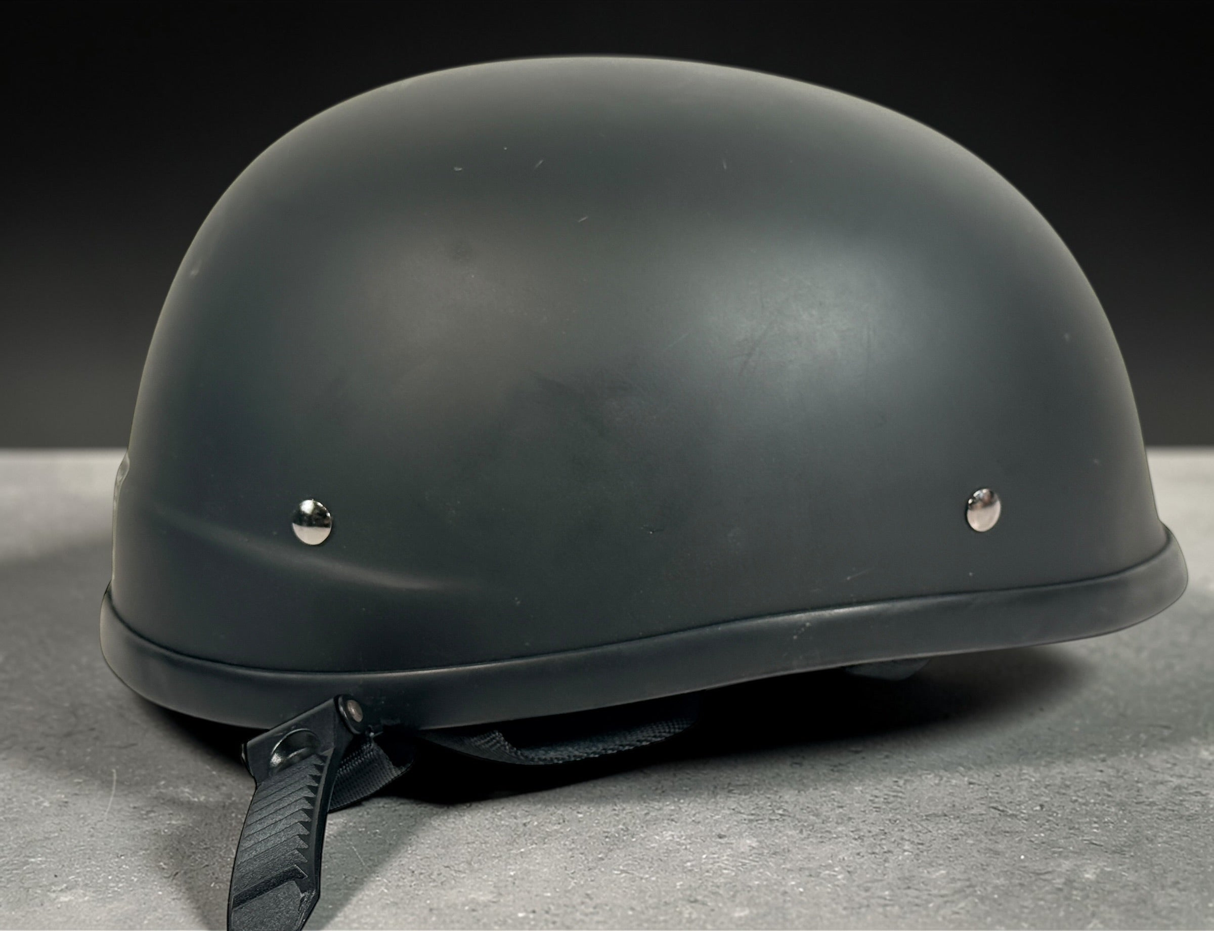 Classic X-Terminator DOT certified motorcycle half helmet size large in matte black. Cruiser style low profile helmet with quick release strap in good condition.