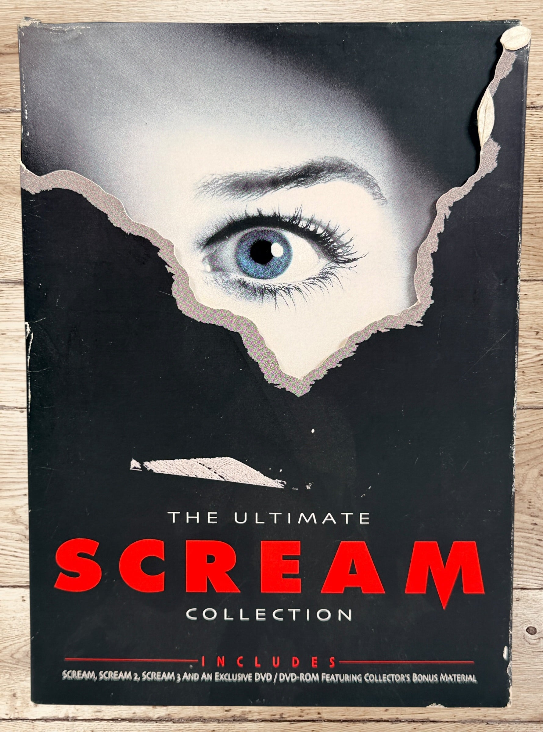 Ultimate Scream Collection DVD box set with Scream, Scream 2, Scream 3 and bonus disc. Horror collector’s edition from Dimension Home Video. Complete set.