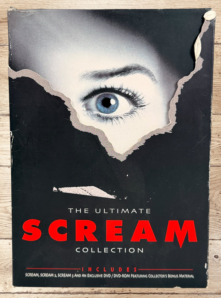 Ultimate Scream Collection DVD box set with Scream, Scream 2, Scream 3 and bonus disc. Horror collector’s edition from Dimension Home Video. Complete set.