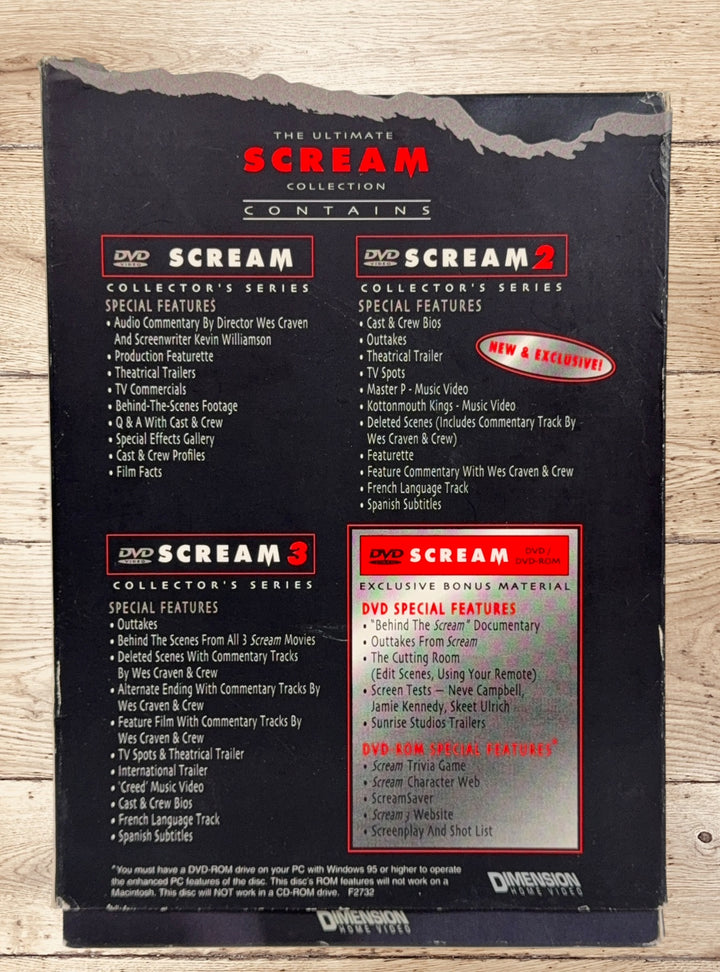 Ultimate Scream Collection DVD box set with Scream, Scream 2, Scream 3 and bonus disc. Horror collector’s edition from Dimension Home Video. Complete set.