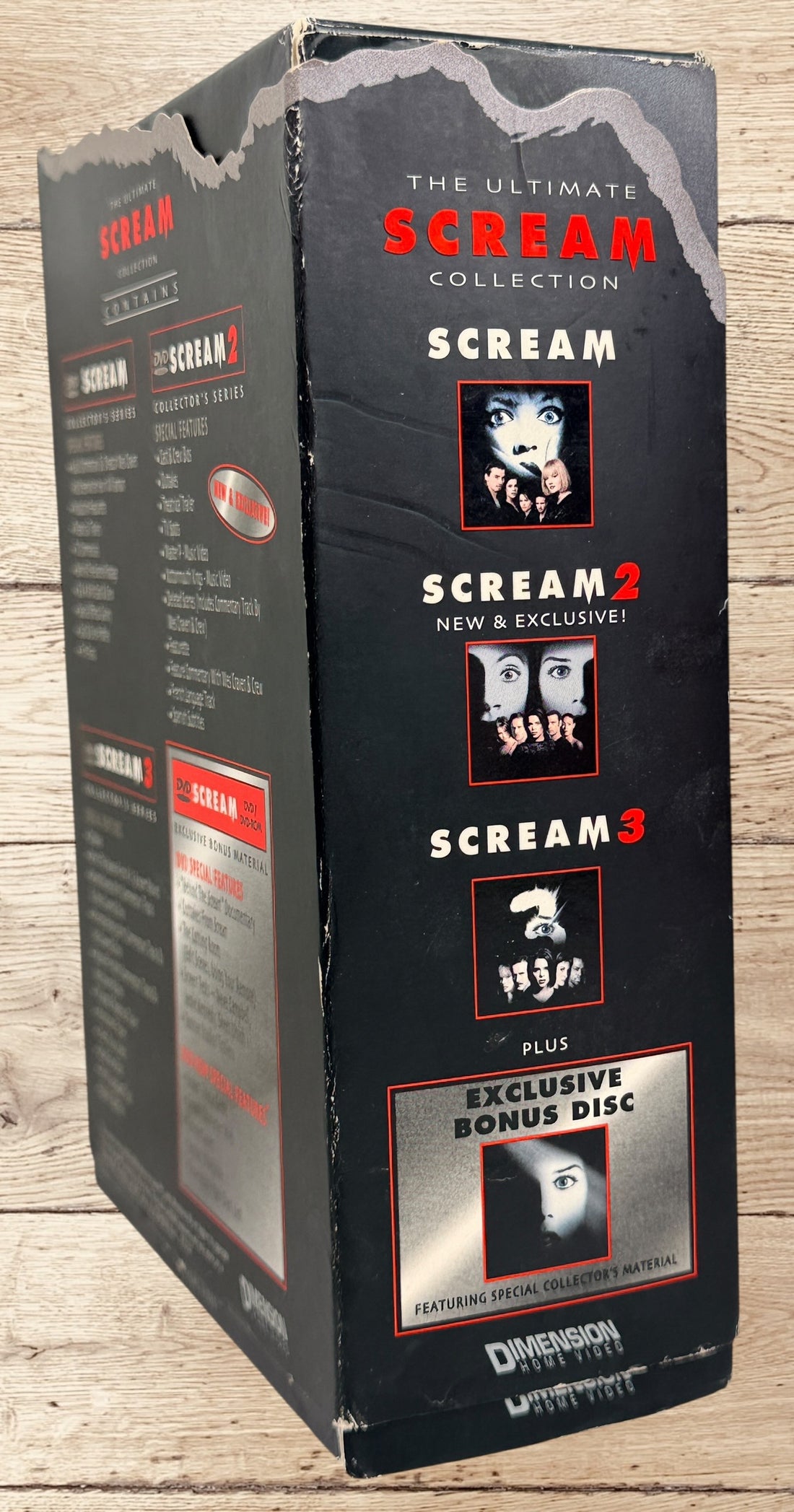 Ultimate Scream Collection DVD box set with Scream, Scream 2, Scream 3 and bonus disc. Horror collector’s edition from Dimension Home Video. Complete set.