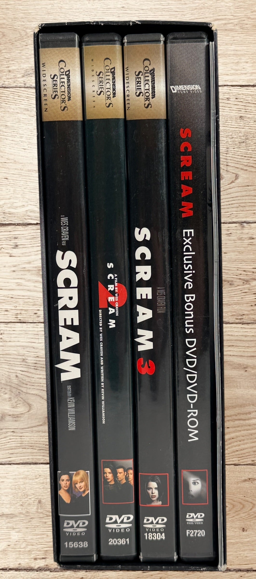 Ultimate Scream Collection DVD box set with Scream, Scream 2, Scream 3 and bonus disc. Horror collector’s edition from Dimension Home Video. Complete set.