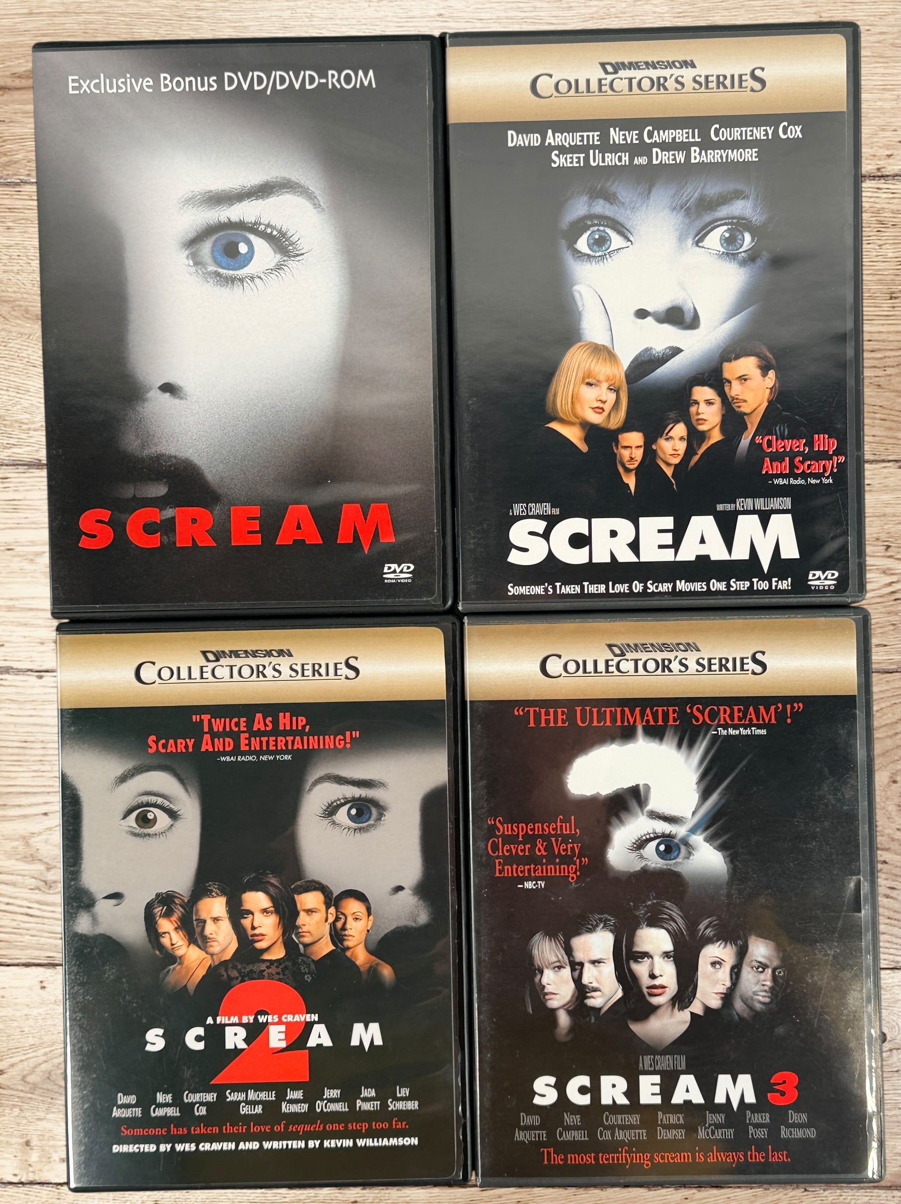Ultimate Scream Collection DVD box set with Scream, Scream 2, Scream 3 and bonus disc. Horror collector’s edition from Dimension Home Video. Complete set.