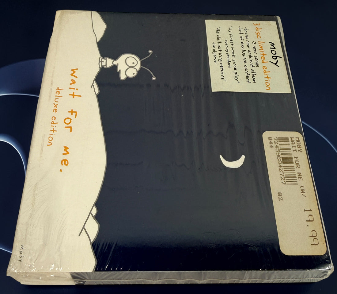 Moby Wait For Me deluxe edition 3 disc set including ambient album and DVD. Factory sealed electronic ambient release from 2009 collectible edition.