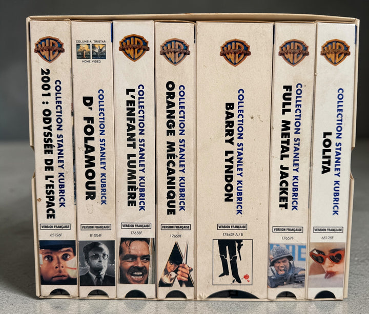 Complete Stanley Kubrick VHS box set with 7 films including The Shining, 2001 and Full Metal Jacket. French edition, vintage Warner Home Video release.
