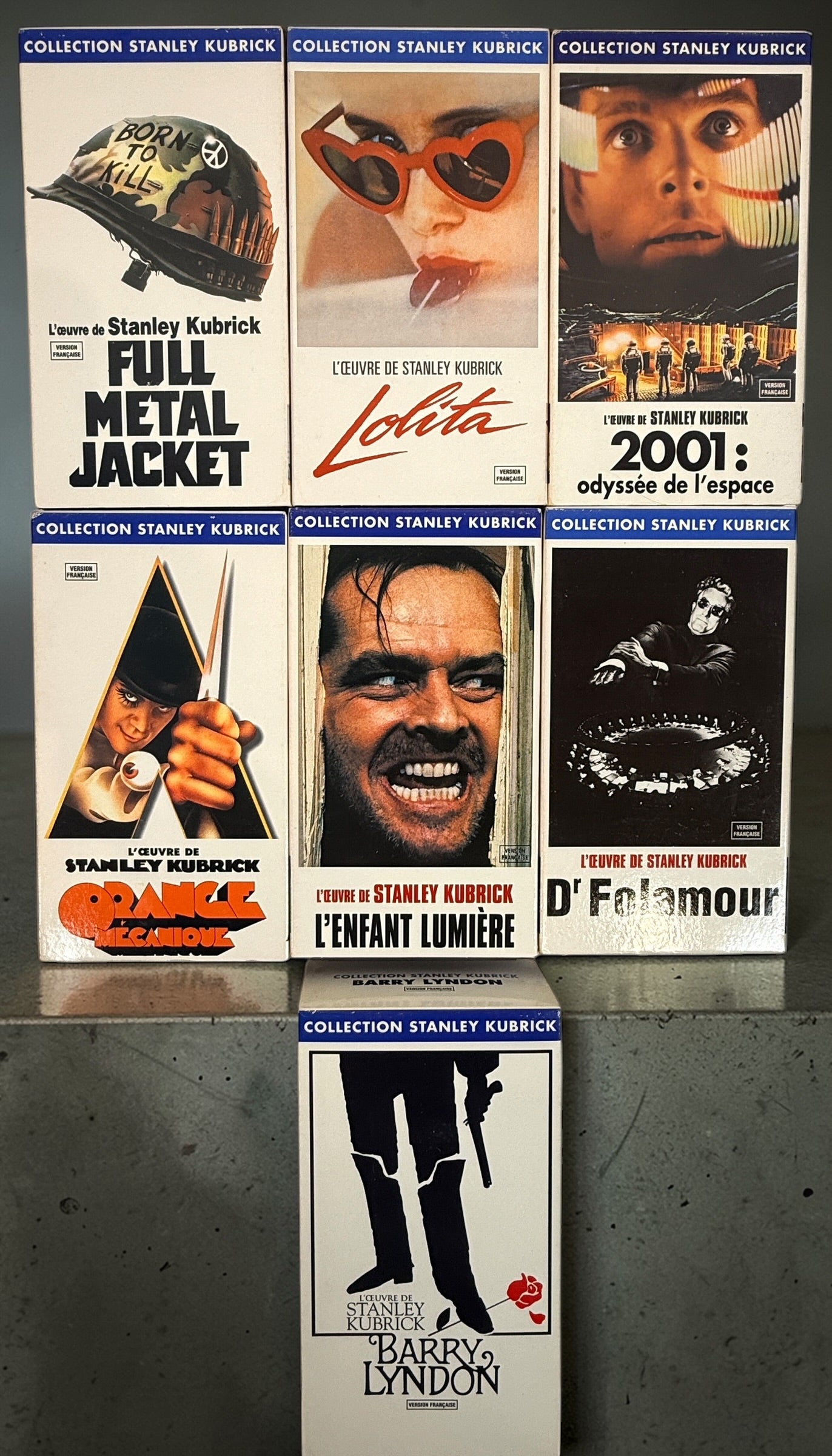 Complete Stanley Kubrick VHS box set with 7 films including The Shining, 2001 and Full Metal Jacket. French edition, vintage Warner Home Video release.