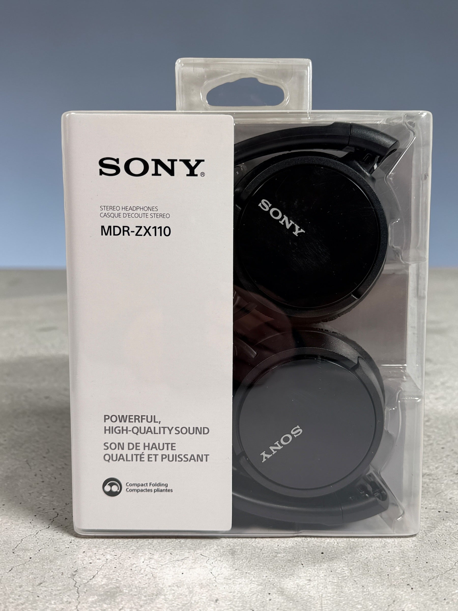 Sony MDR-ZX110 wired stereo headphones in black. Compact folding design with 3.5mm jack. Lightweight portable Sony headphones new in original packaging.