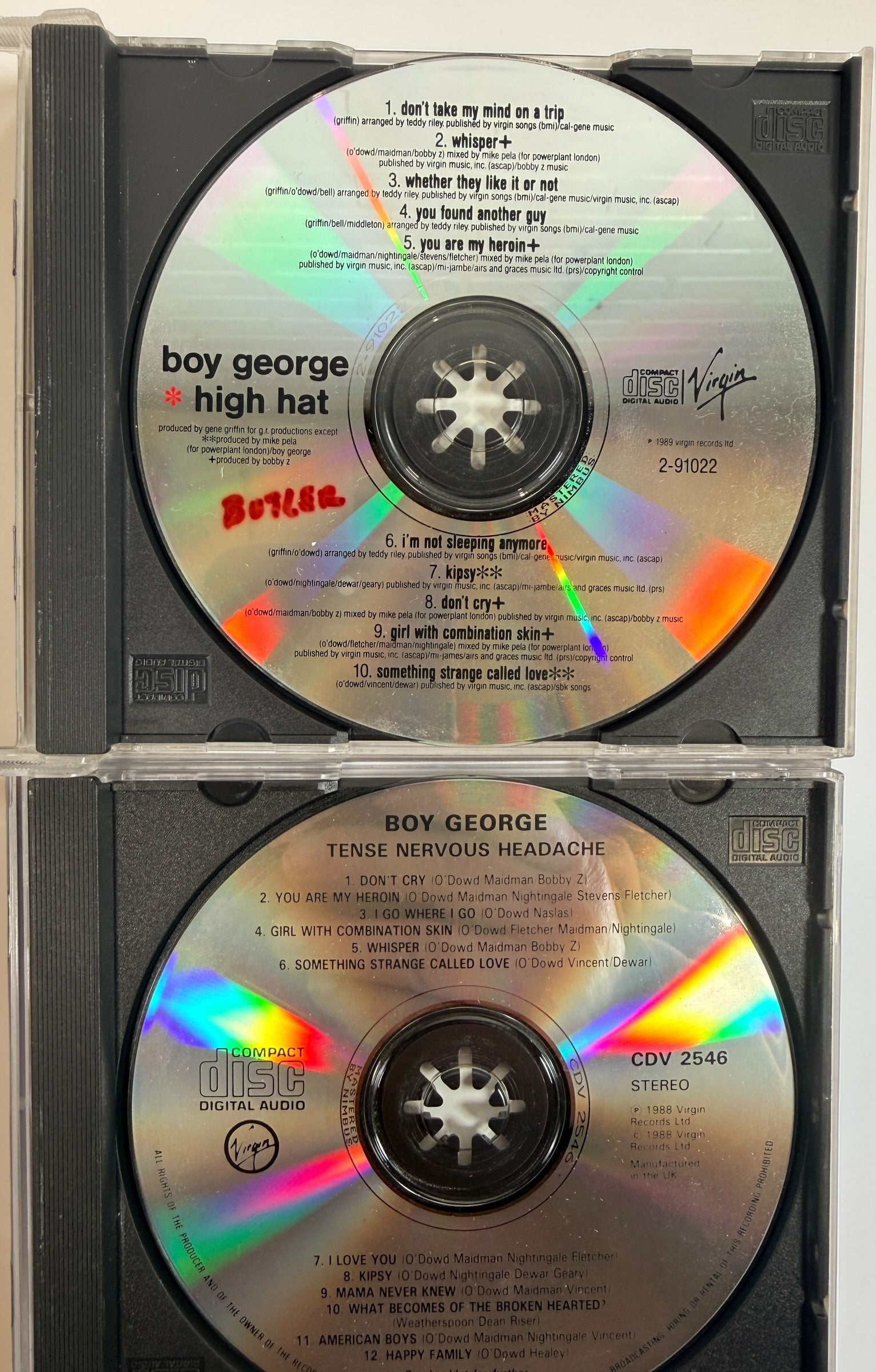 Boy George CD bundle featuring High Hat and Tense Nervous Headache on Virgin Records. Original late-1980s synth pop albums in very good condition.