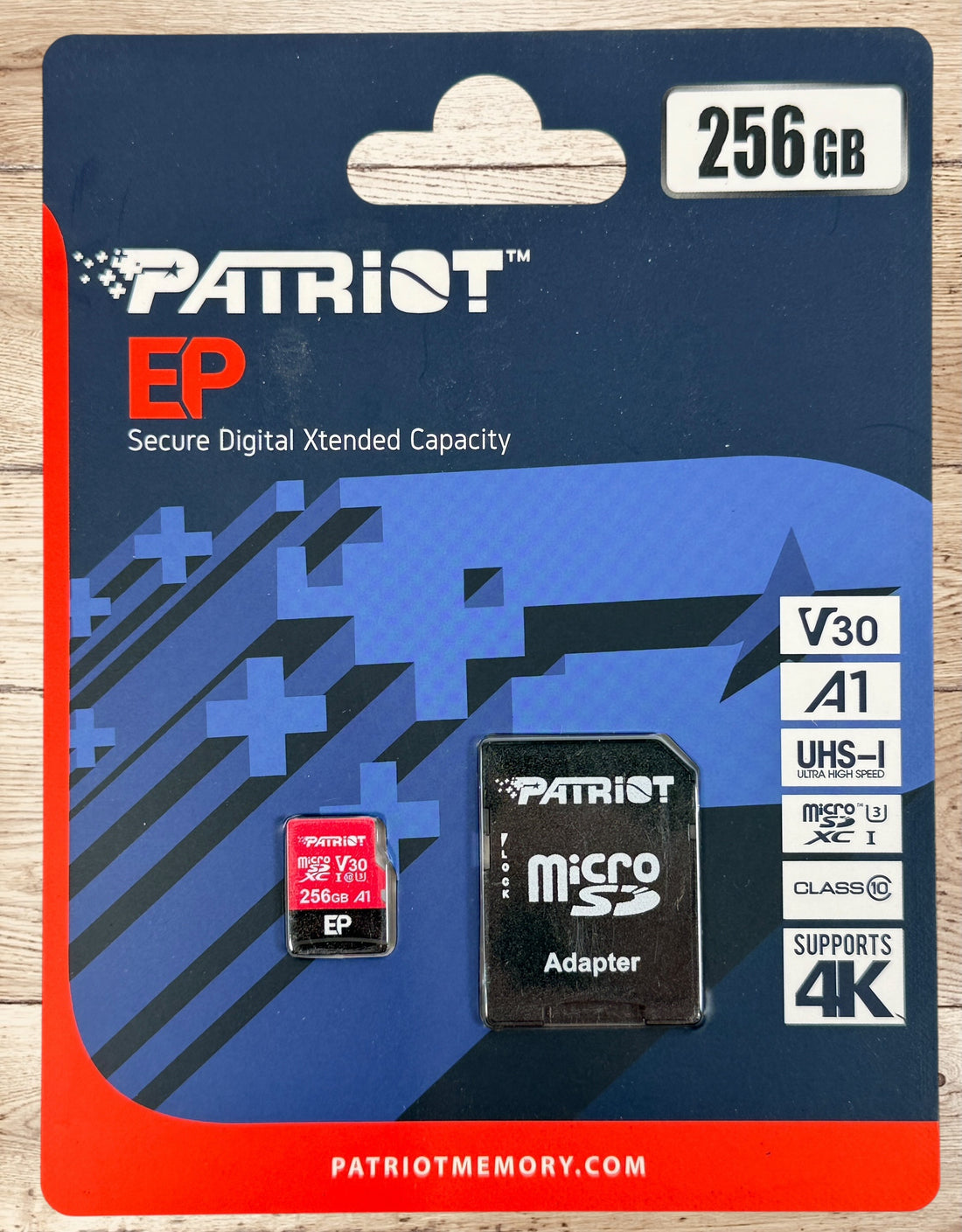 Patriot EP 256GB microSDXC memory card with V30 A1 UHS-I speed rating. Supports 4K video recording and includes SD adapter for cameras, laptops, and devices.