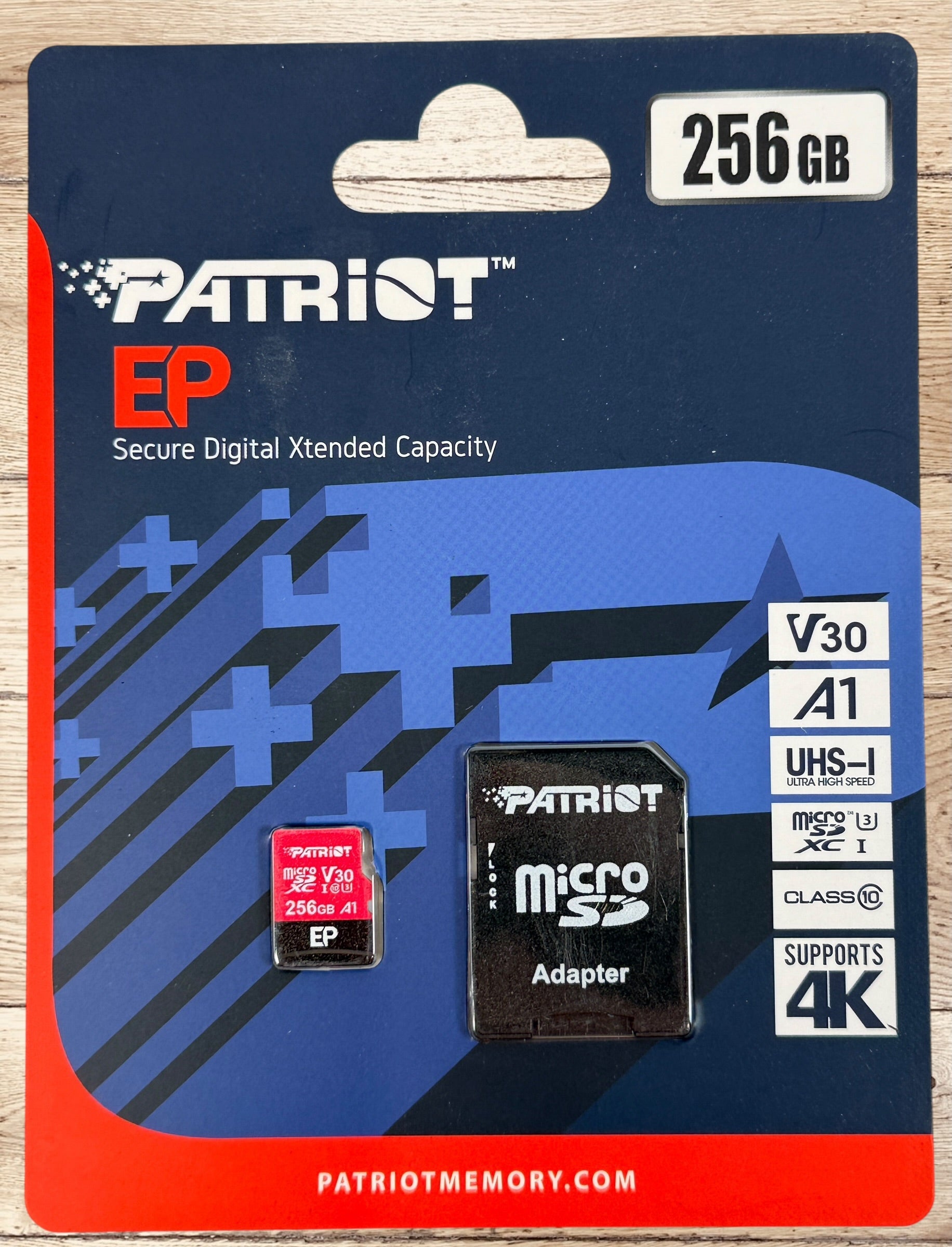 Patriot EP 256GB microSDXC memory card with V30 A1 UHS-I speed rating. Supports 4K video recording and includes SD adapter for cameras, laptops, and devices.