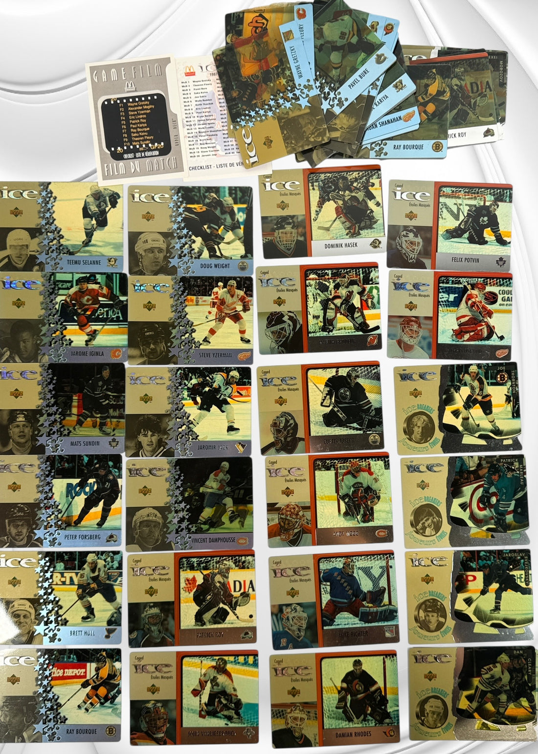 1997 Upper Deck Ice NHL hockey card lot with 60 cards featuring Roy, Brodeur, Hasek, Selanne, Iginla and other stars. Vintage 1990s hockey cards.