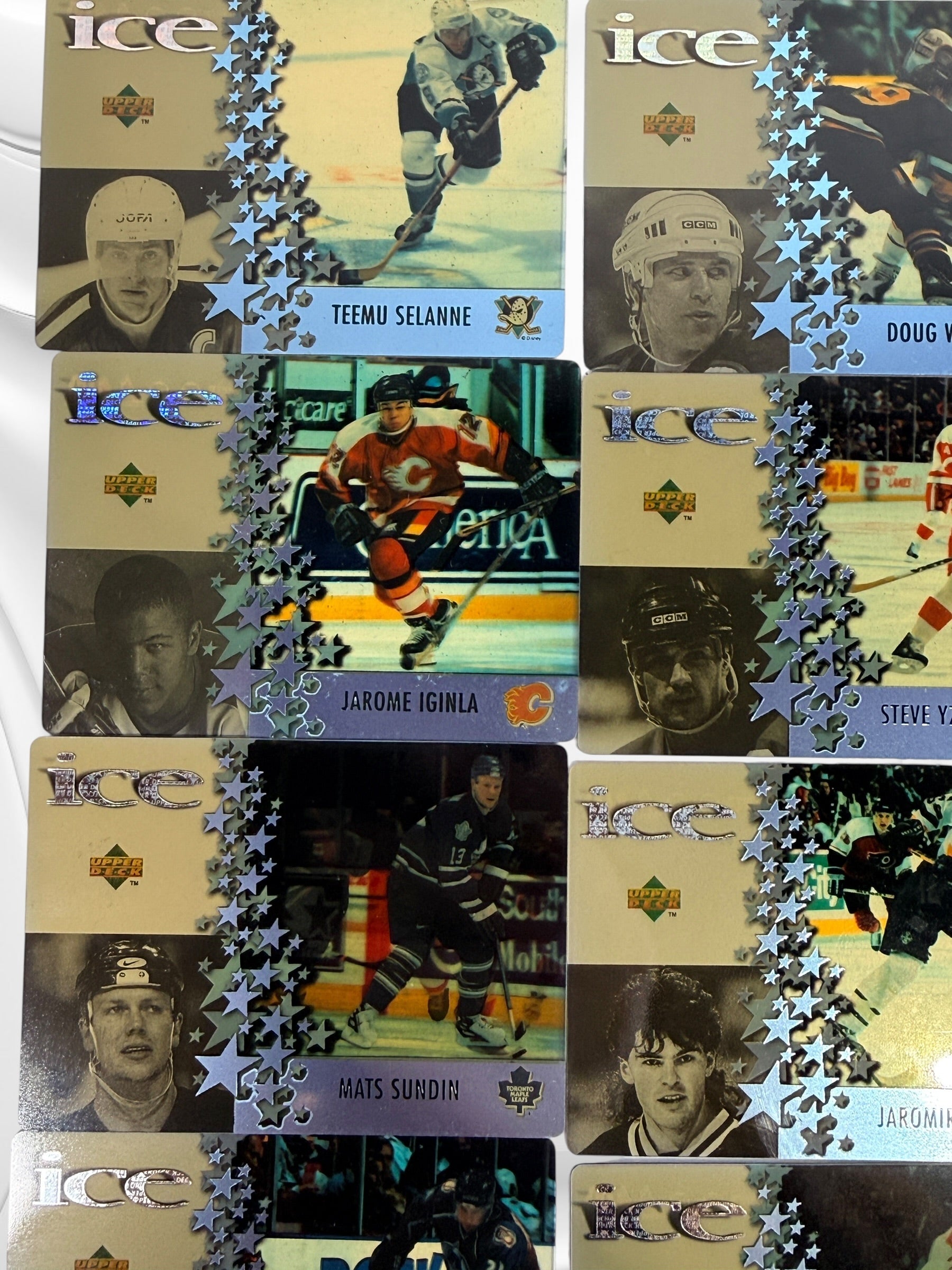 1997 Upper Deck Ice NHL hockey card lot with 60 cards featuring Roy, Brodeur, Hasek, Selanne, Iginla and other stars. Vintage 1990s hockey cards.