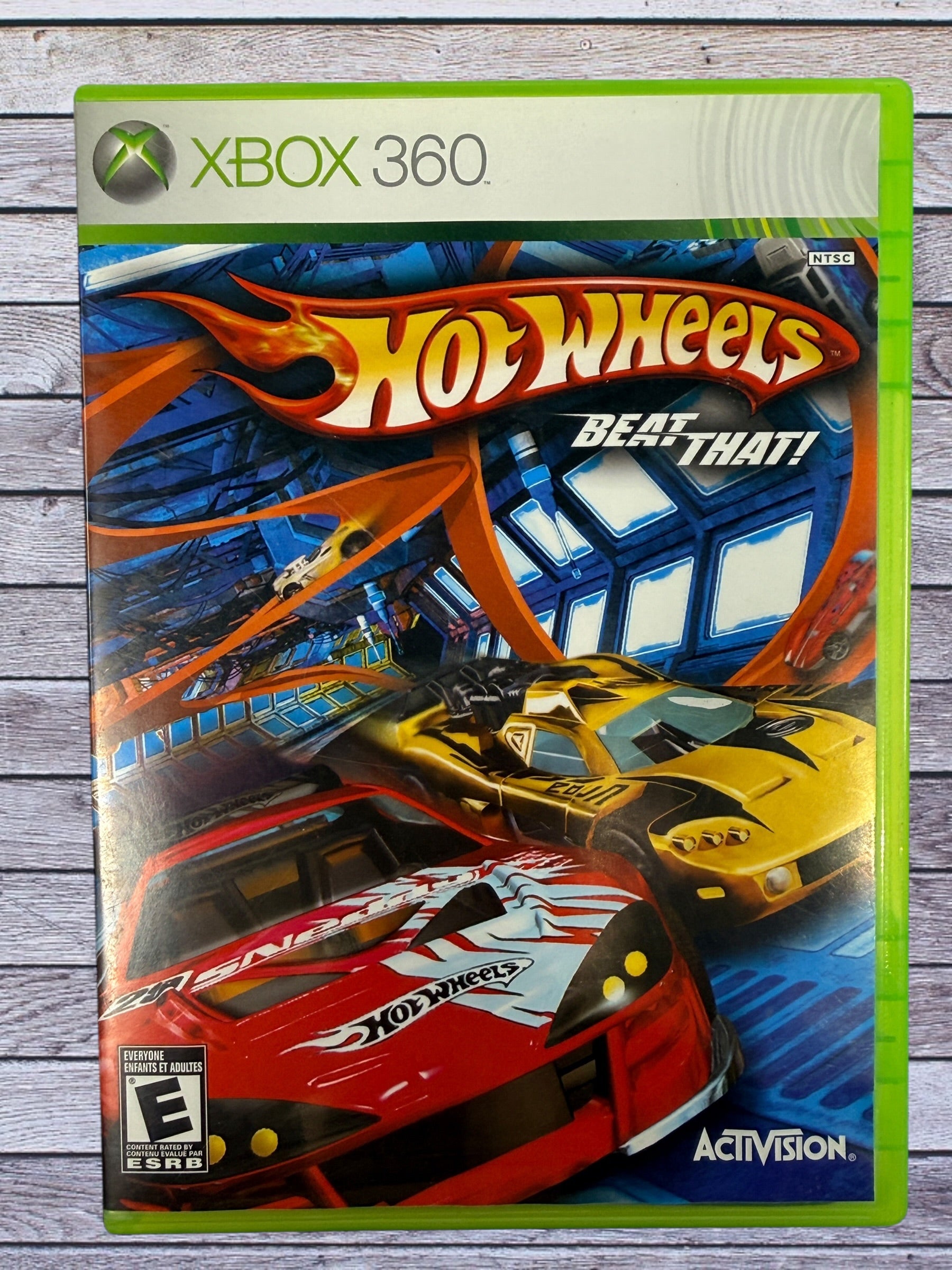 Hot Wheels Beat That Xbox 360 racing game by Activision. Complete with case and disc. Classic arcade Hot Wheels track racing with loops, power-ups and multiplayer fun.