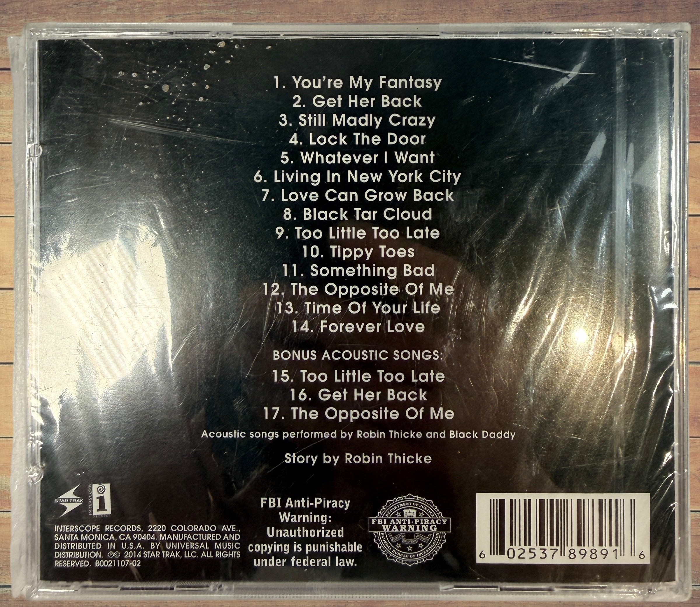 Sealed deluxe CD edition of Robin Thicke’s 2014 album Paula featuring three acoustic bonus tracks. Original retail copy in shrink wrap with jewel case.