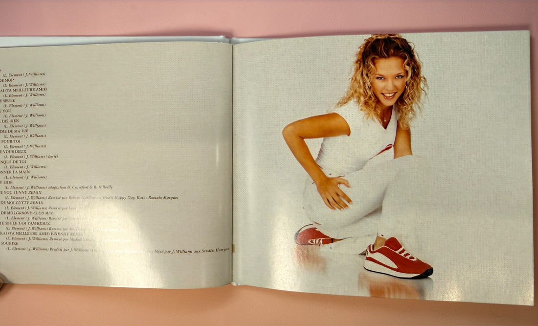 Lorie CD bundle with Pres De Toi and Attitudes including DVD. French pop classics from early 2000s with original cases and inserts.