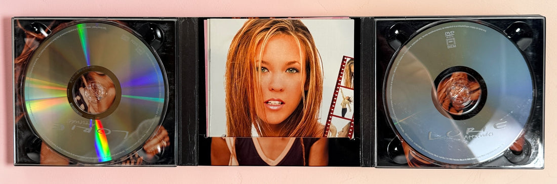 Lorie CD bundle with Pres De Toi and Attitudes including DVD. French pop classics from early 2000s with original cases and inserts.