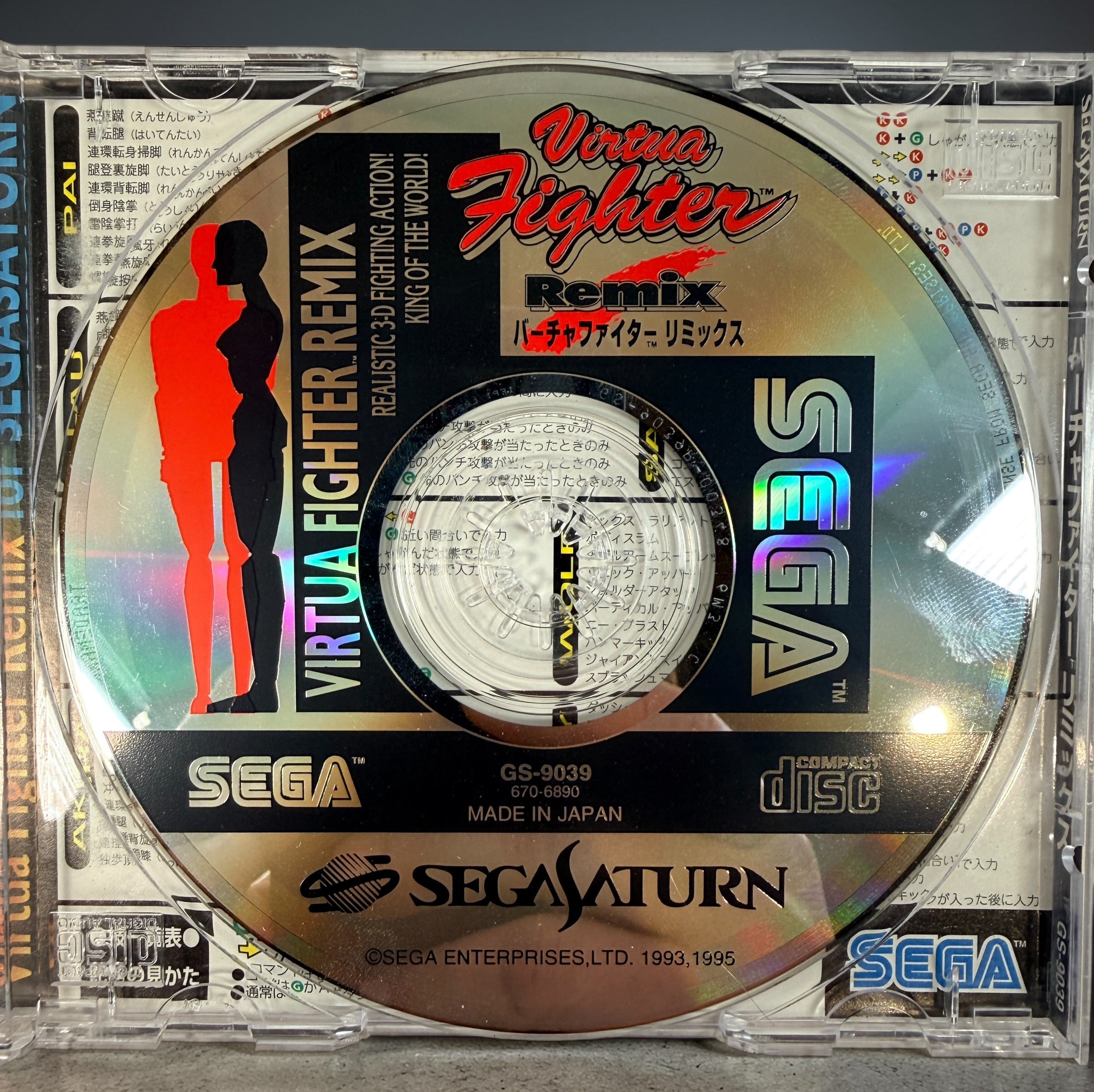 Sega Saturn Virtua Fighter Remix Japanese edition complete with obi. Classic 90s fighting game by AM2 in clean condition, ideal for collectors.