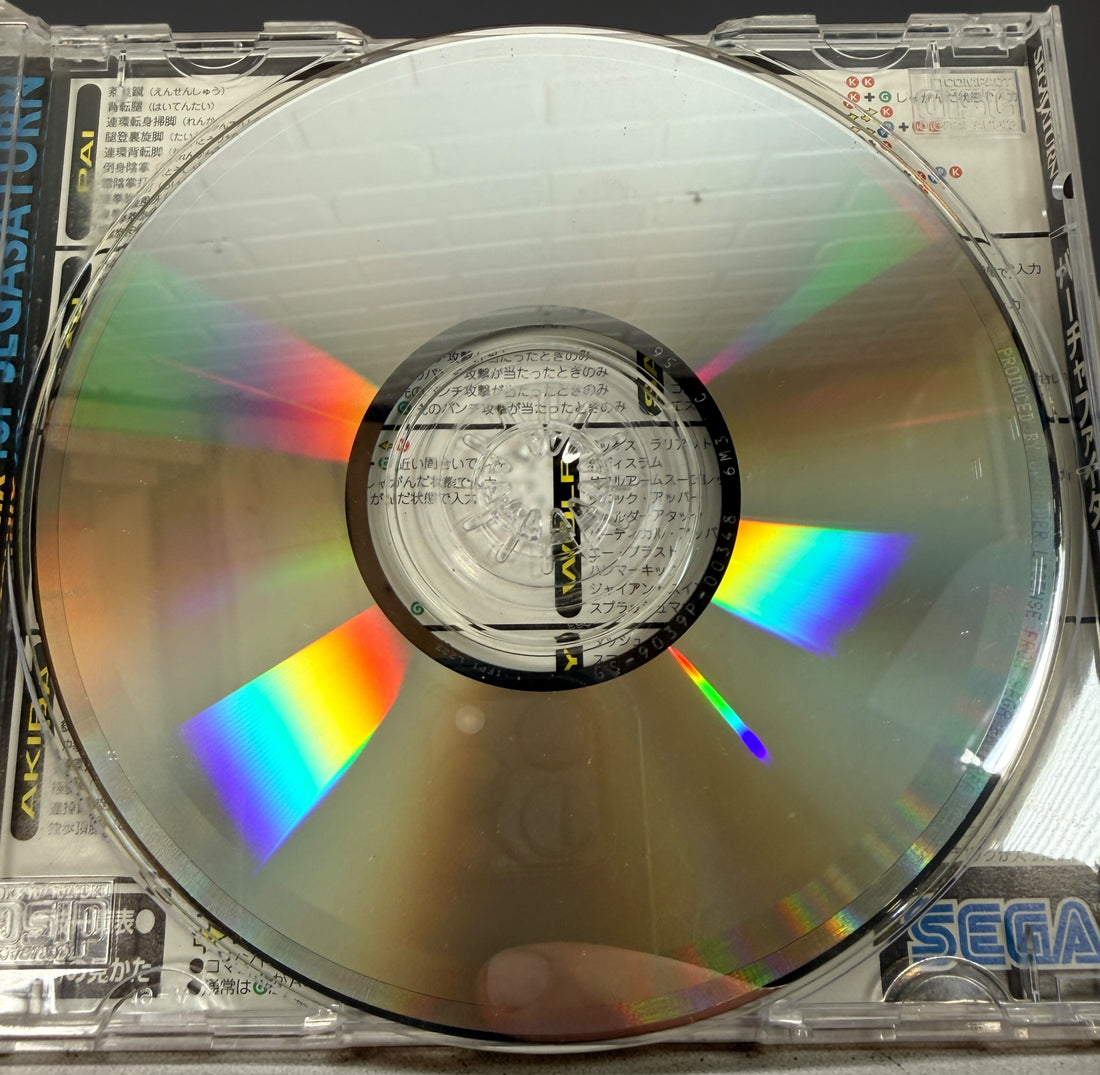 Sega Saturn Virtua Fighter Remix Japanese edition complete with obi. Classic 90s fighting game by AM2 in clean condition, ideal for collectors.