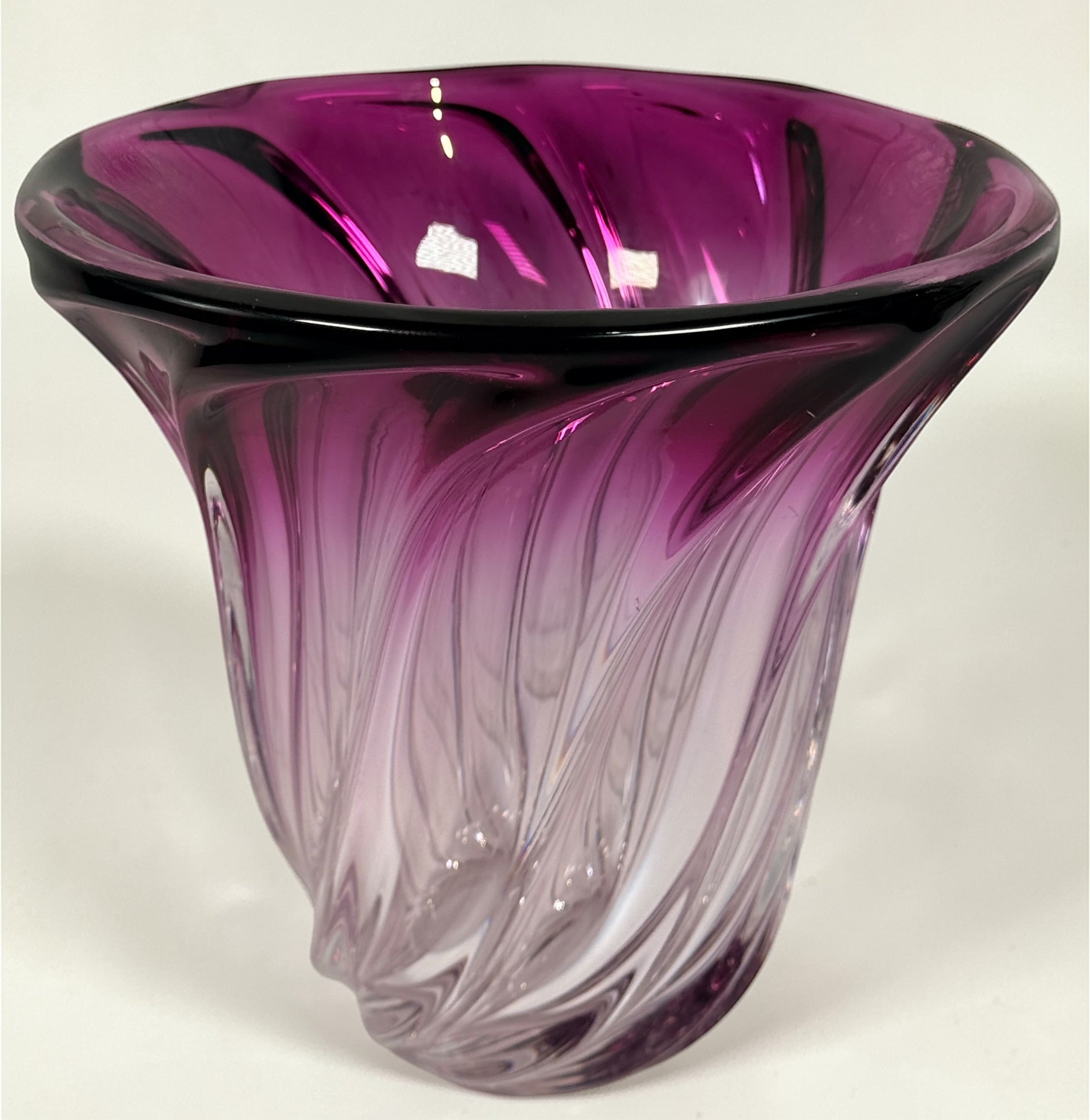 Signed Val Saint Lambert crystal vase in amethyst overlay with swirl design. Heavy Belgian art glass piece with vibrant color and classic vintage appeal.
