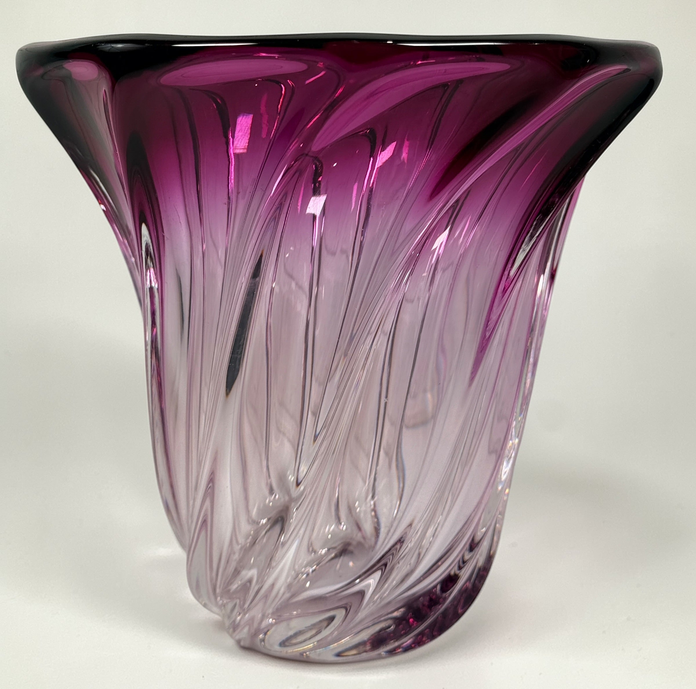 Signed Val Saint Lambert crystal vase in amethyst overlay with swirl design. Heavy Belgian art glass piece with vibrant color and classic vintage appeal.