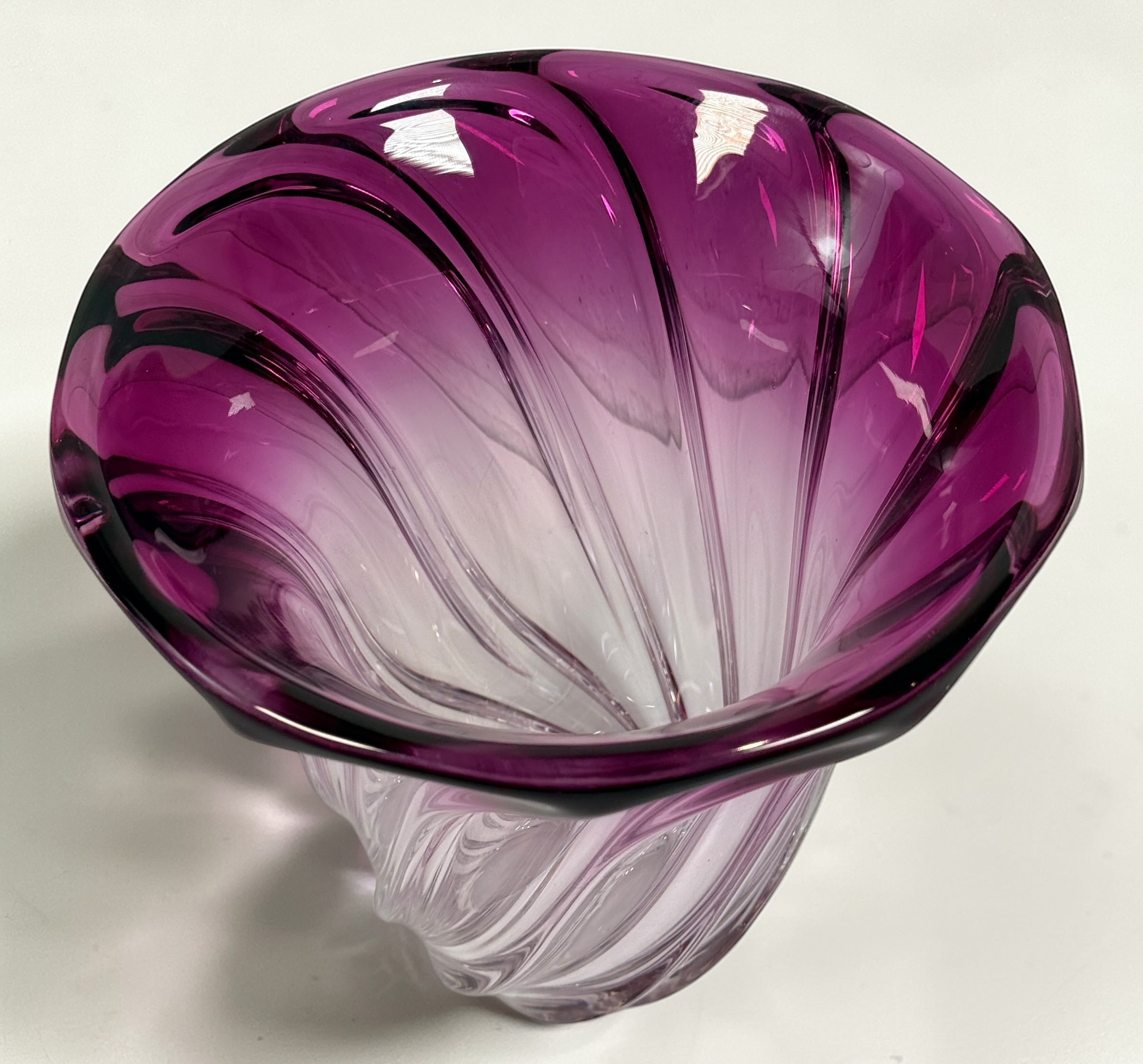 Signed Val Saint Lambert crystal vase in amethyst overlay with swirl design. Heavy Belgian art glass piece with vibrant color and classic vintage appeal.