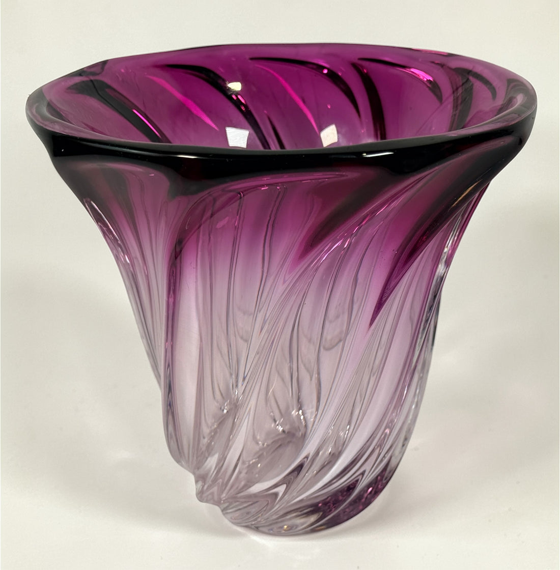 Signed Val Saint Lambert crystal vase in amethyst overlay with swirl design. Heavy Belgian art glass piece with vibrant color and classic vintage appeal.