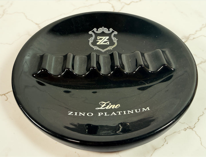 Zino Platinum black ceramic cigar ashtray with 5 rests. Davidoff branded accessory in very good condition, ideal for cigar lounges, collectors, or home bar setups.