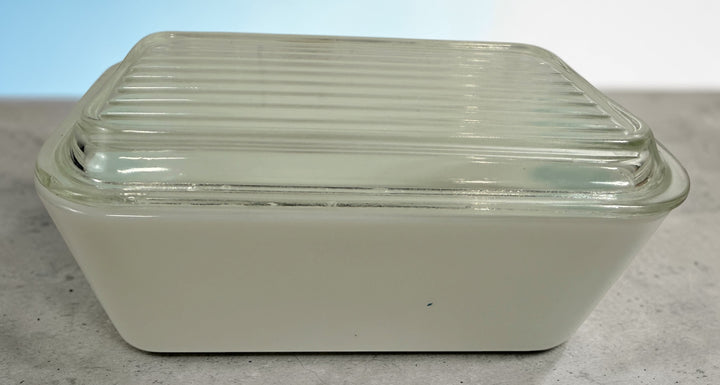 Vintage Pyrex Butterprint casserole dish 502 with lid, turquoise rooster pattern. Classic 1950s kitchen collectible in great condition.