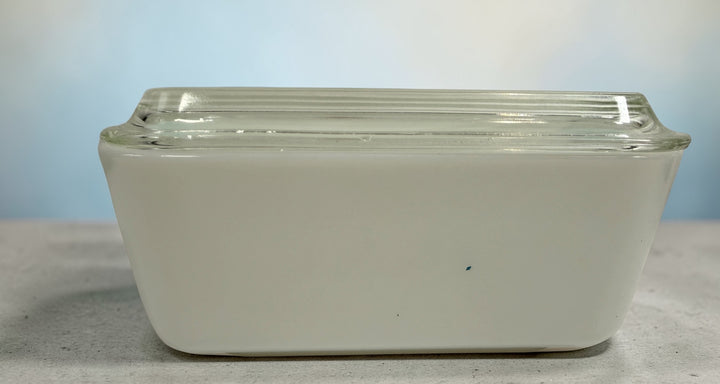 Vintage Pyrex Butterprint casserole dish 502 with lid, turquoise rooster pattern. Classic 1950s kitchen collectible in great condition.