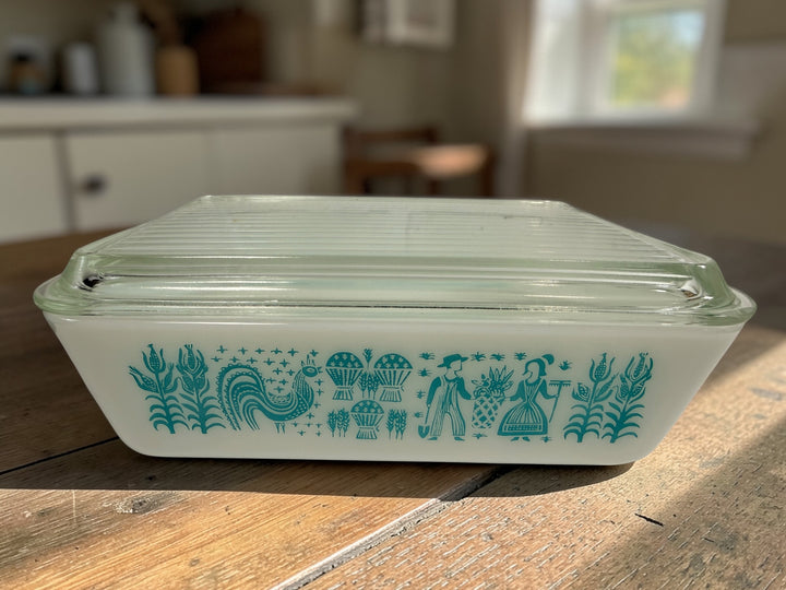 Vintage Pyrex 503 Butterprint refrigerator dish with lid. Turquoise Amish pattern milk glass container, mid century kitchen storage collectible.