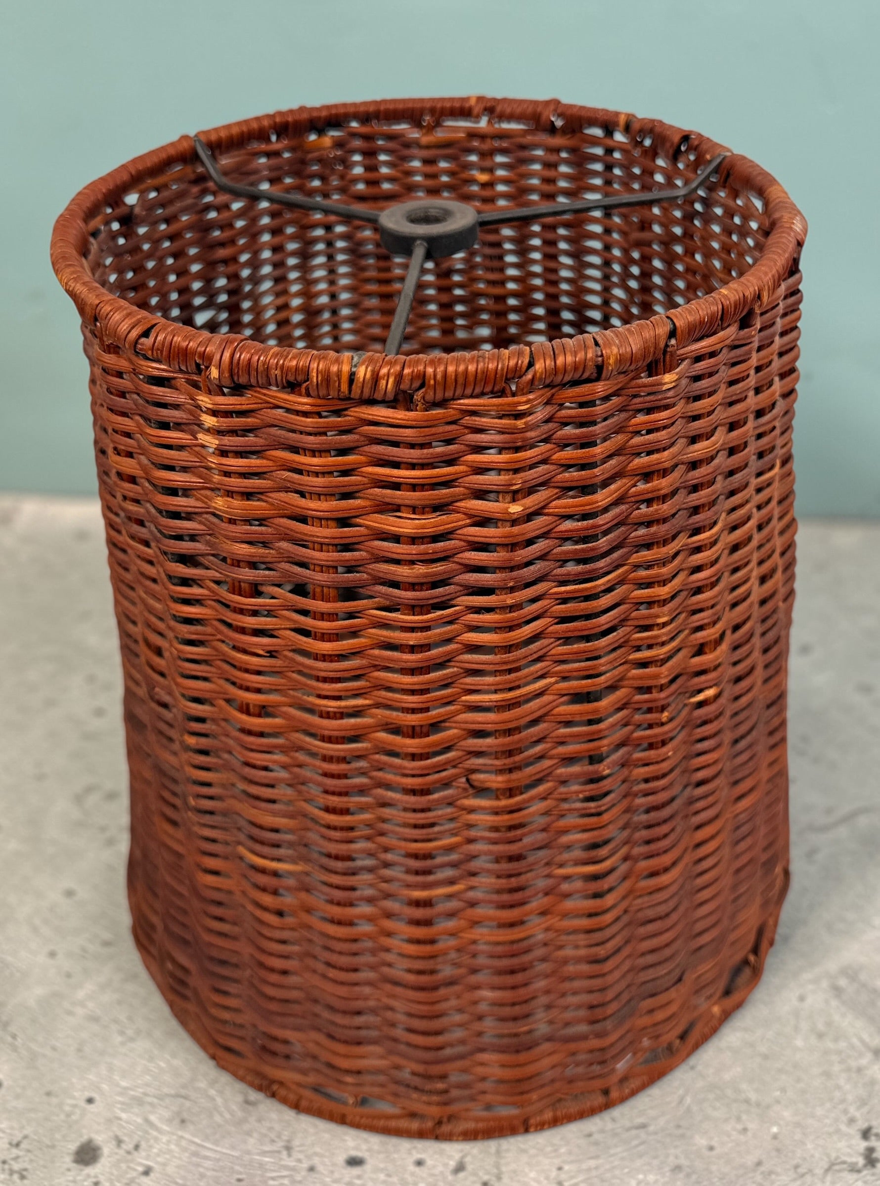 Pair of vintage rattan lamp shades in woven boho style. Drum shape with spider fitter, perfect for table or floor lamps and warm natural decor interiors.