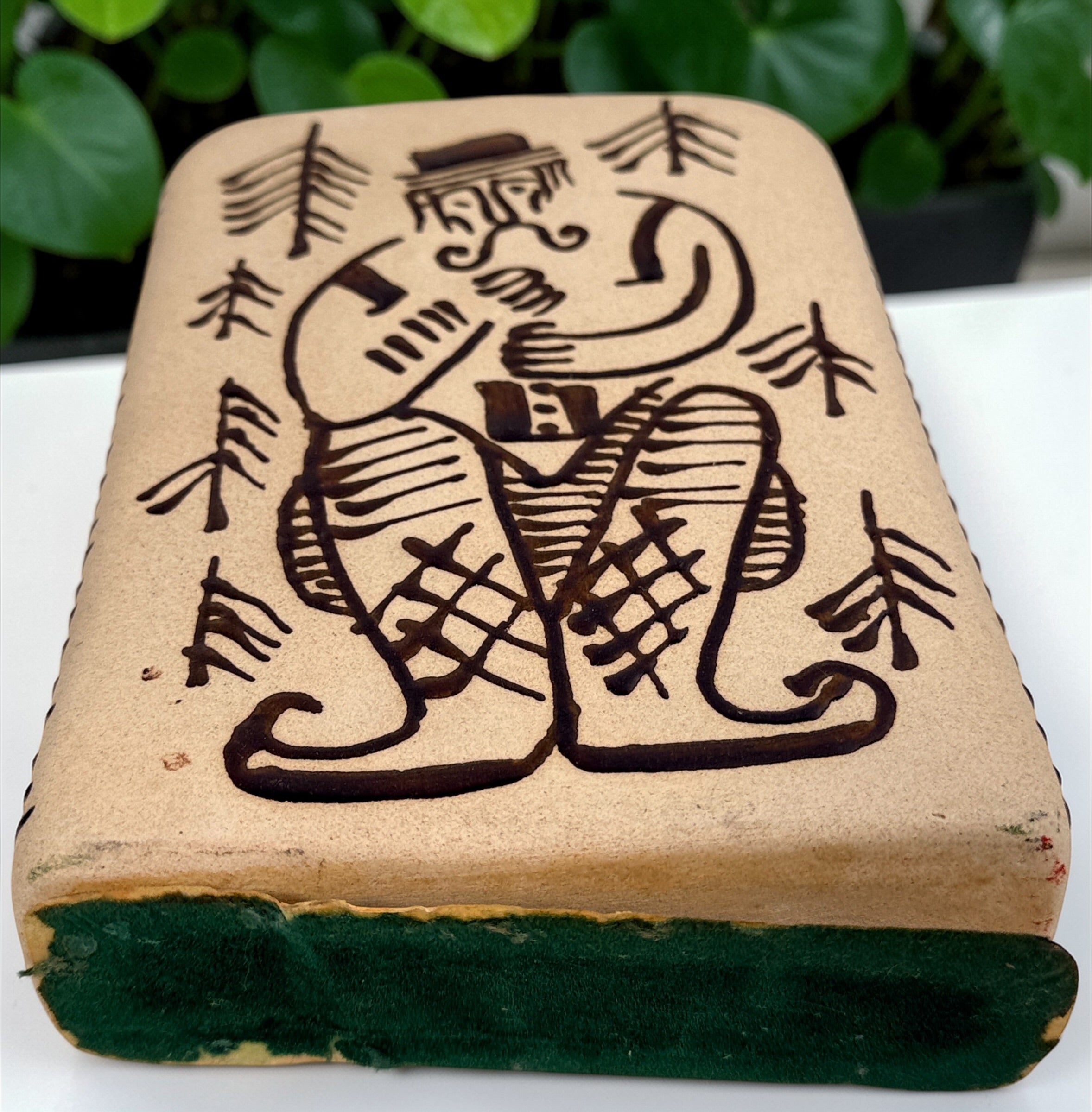 1960s LKSF Lviv Hutsul decanter bottle in majolica ceramic. Soviet-era Ukrainian folk art shtof with traditional figure and forest design.