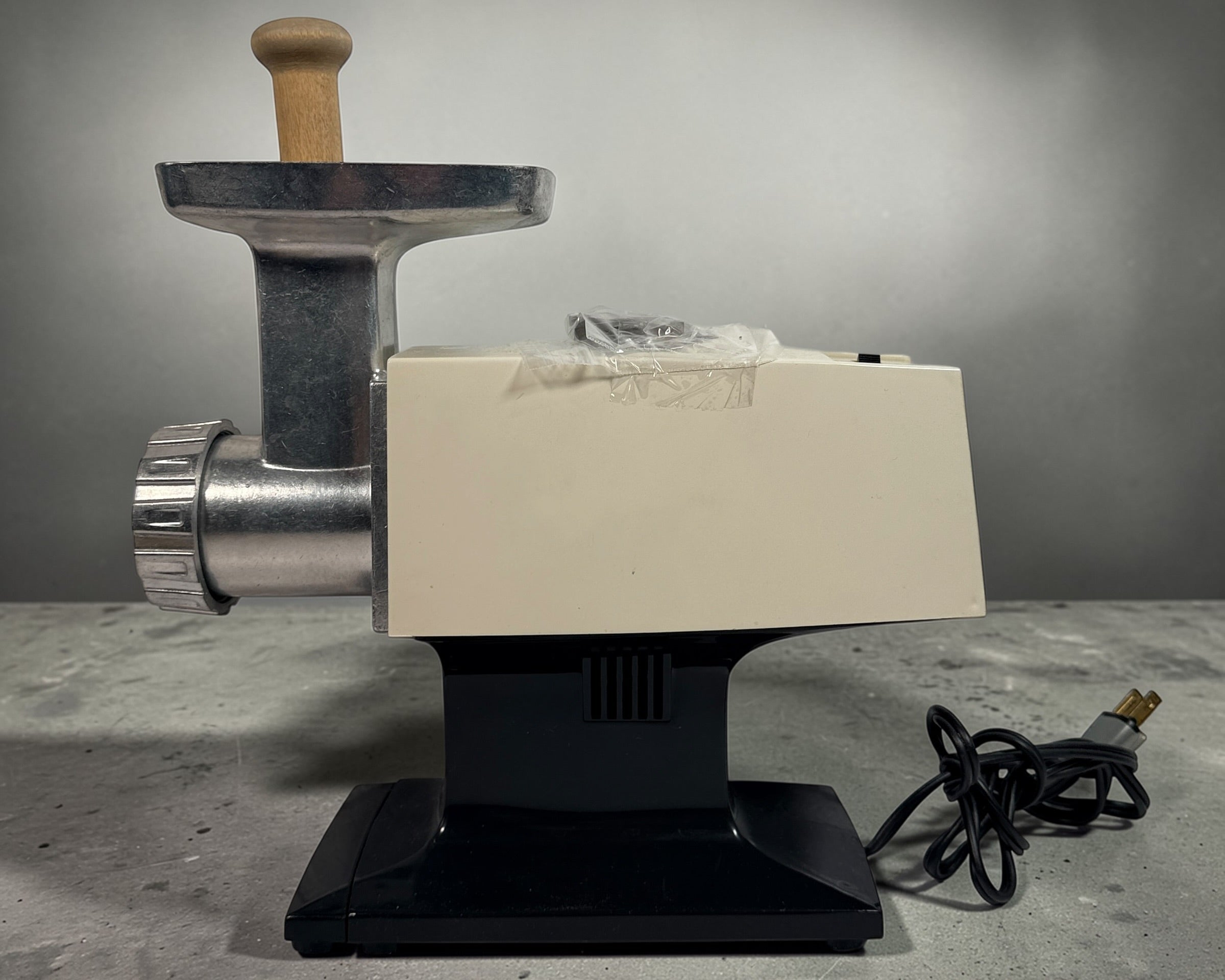 Vintage Rival electric meat grinder, tested working with metal tray and wood pusher. Classic retro kitchen appliance for home grinding and food prep.
