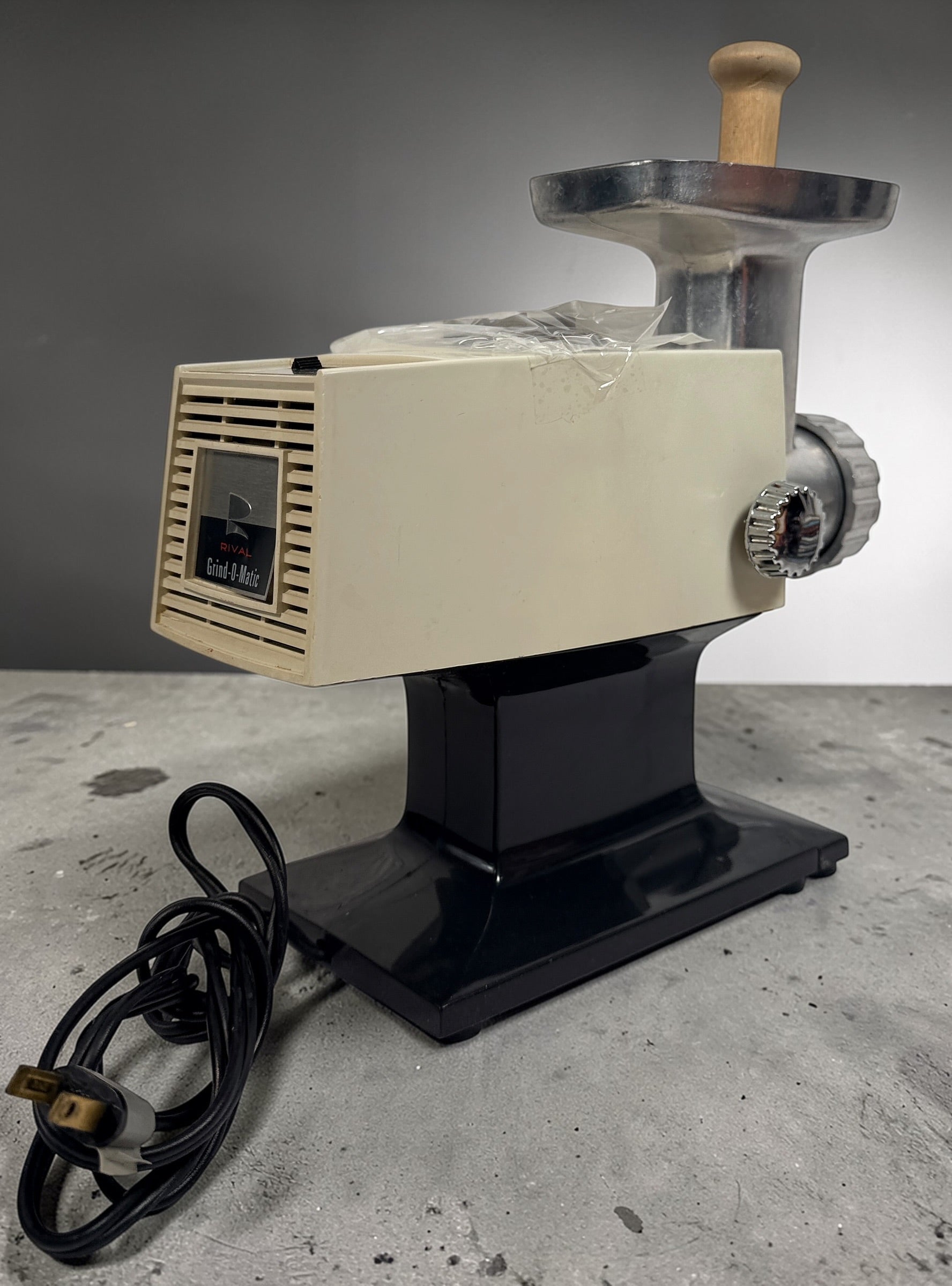 Vintage Rival electric meat grinder, tested working with metal tray and wood pusher. Classic retro kitchen appliance for home grinding and food prep.
