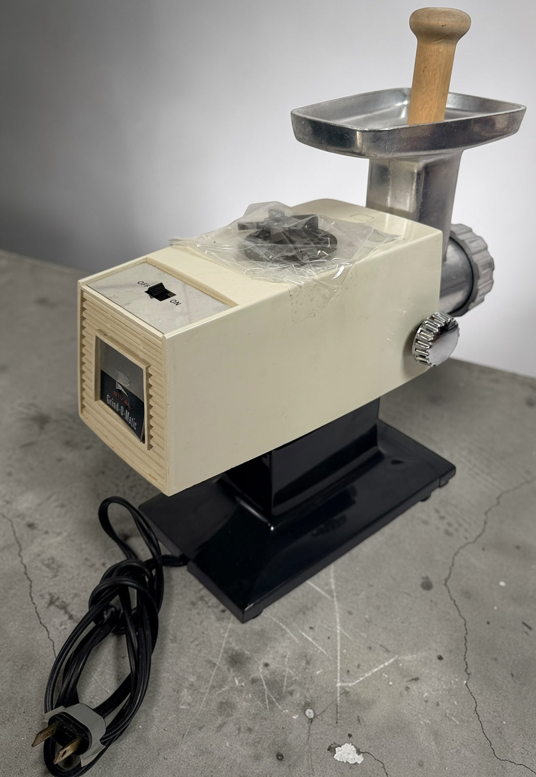 Vintage Rival electric meat grinder, tested working with metal tray and wood pusher. Classic retro kitchen appliance for home grinding and food prep.