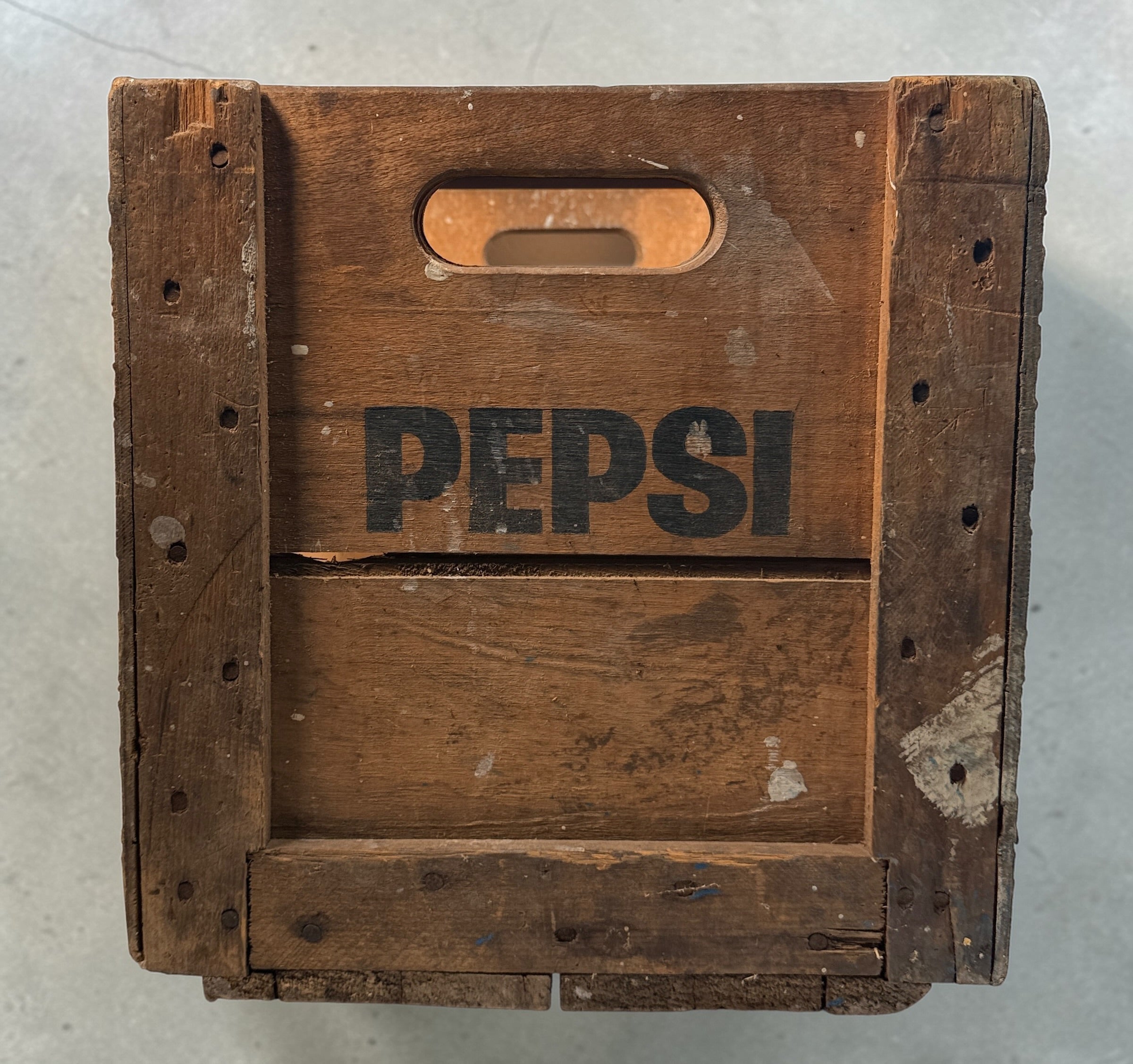 Vintage Pepsi-Cola wooden crate from Canada with classic stencil branding. Rustic decor piece perfect for storage or display in farmhouse or vintage spaces.