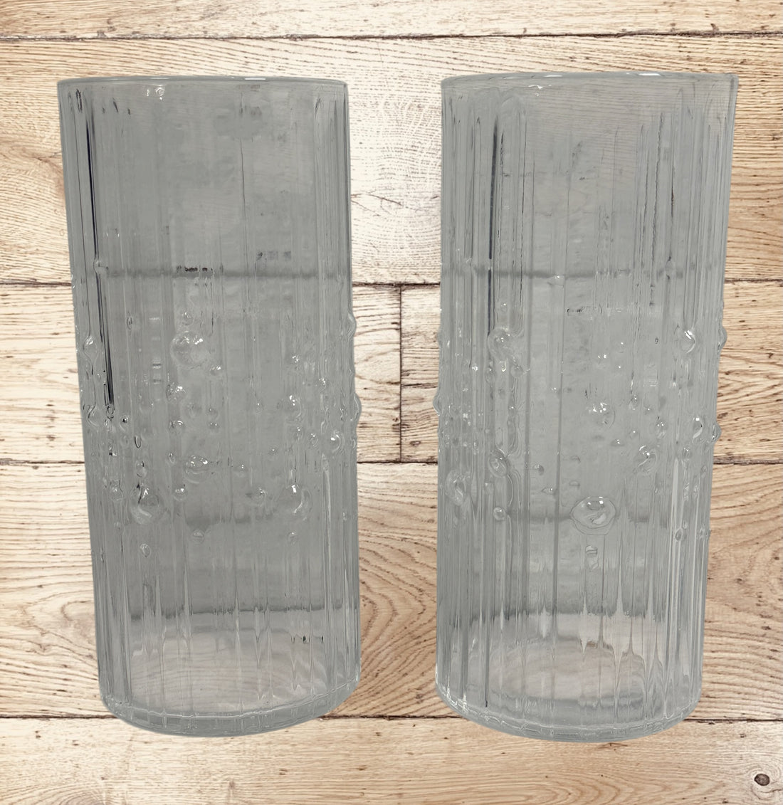 Vintage Iittala Mesi highball glass pair by Tapio Wirkkala. Finnish MCM barware with textured bubble design. Set of 2 in excellent condition.