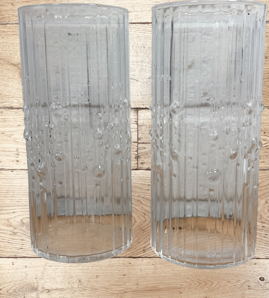Vintage Iittala Mesi highball glass pair by Tapio Wirkkala. Finnish MCM barware with textured bubble design. Set of 2 in excellent condition.