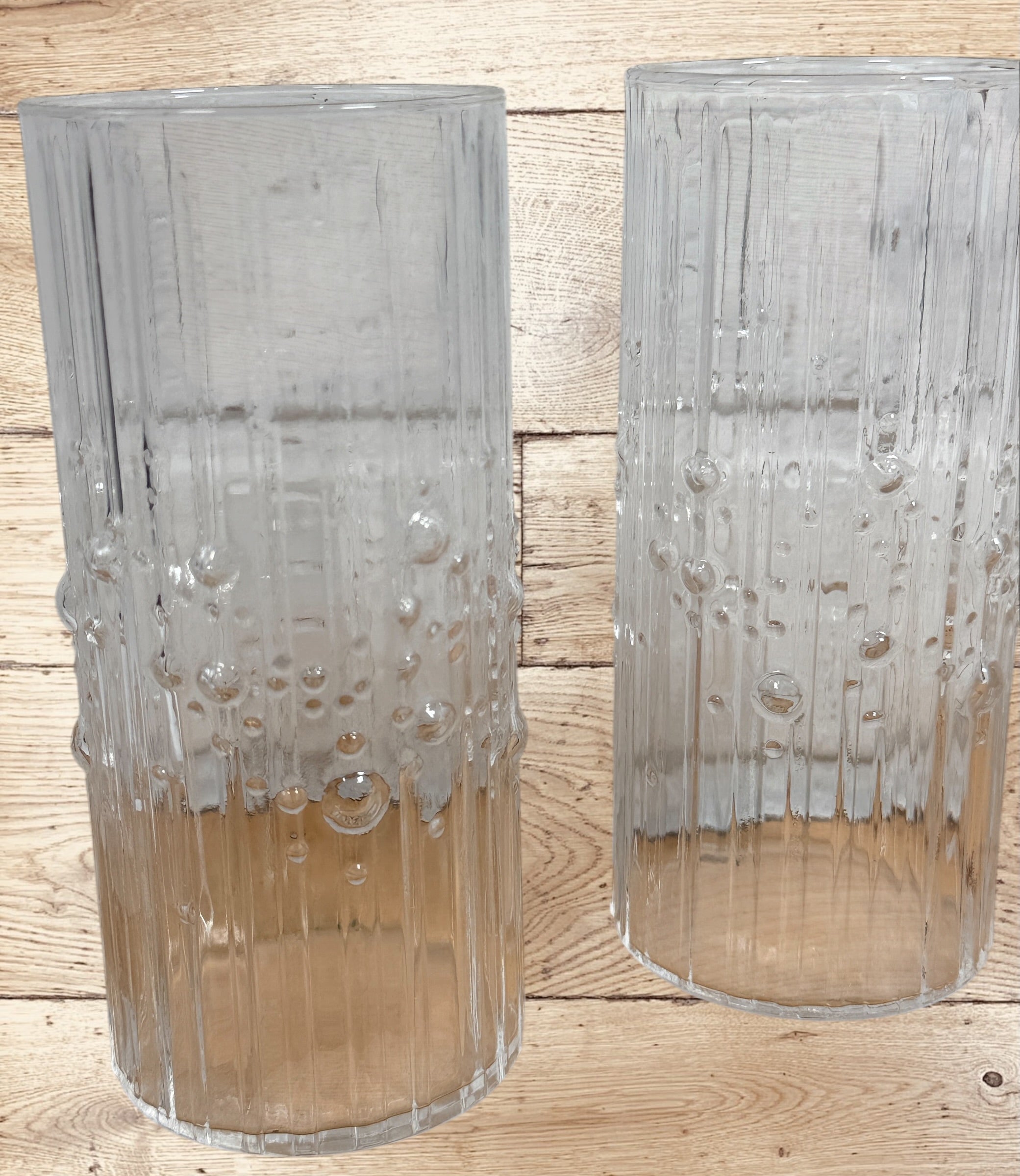 Vintage Iittala Mesi highball glass pair by Tapio Wirkkala. Finnish MCM barware with textured bubble design. Set of 2 in excellent condition.