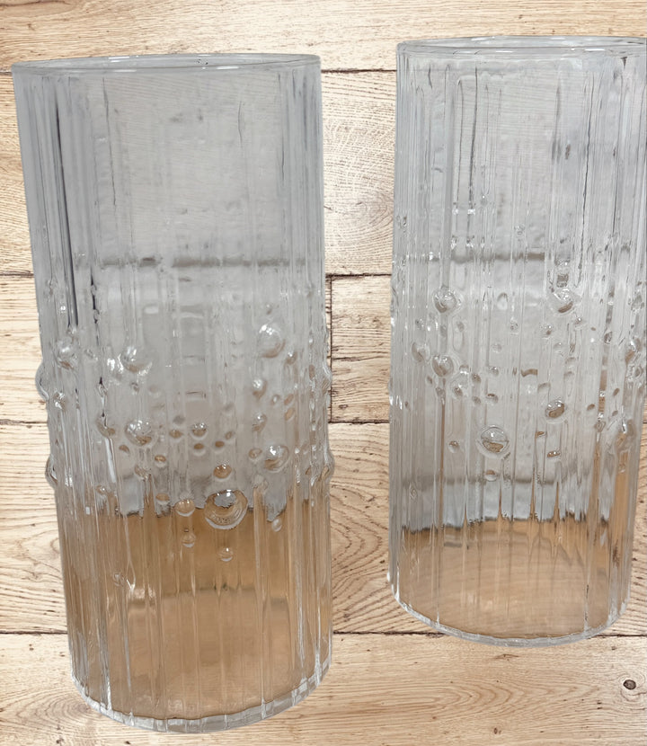 Vintage Iittala Mesi highball glass pair by Tapio Wirkkala. Finnish MCM barware with textured bubble design. Set of 2 in excellent condition.