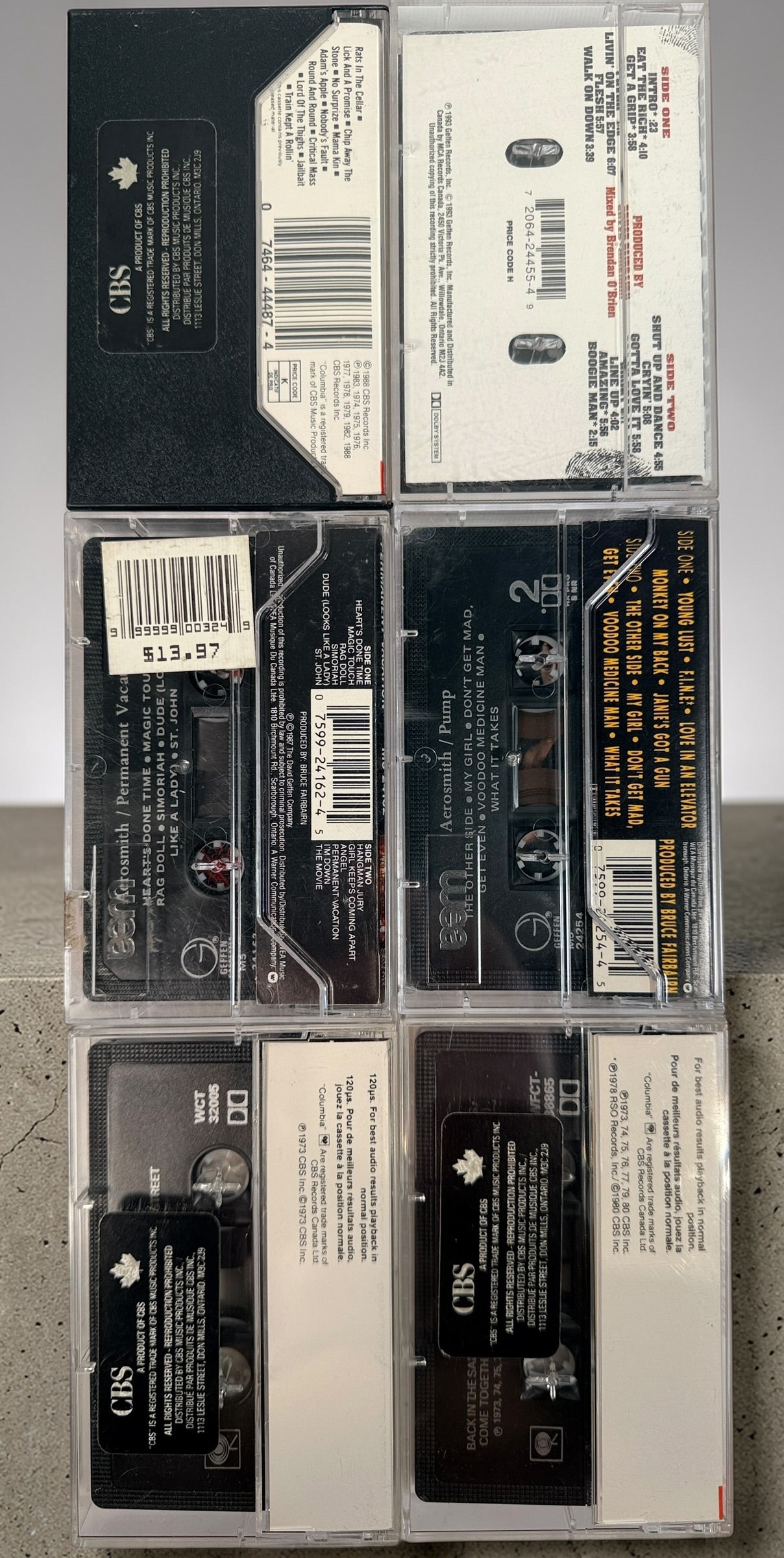 Vintage Aerosmith cassette lot with 6 classic albums including Pump and Get a Grip. Columbia and Geffen releases, perfect for collectors and retro audio setups.