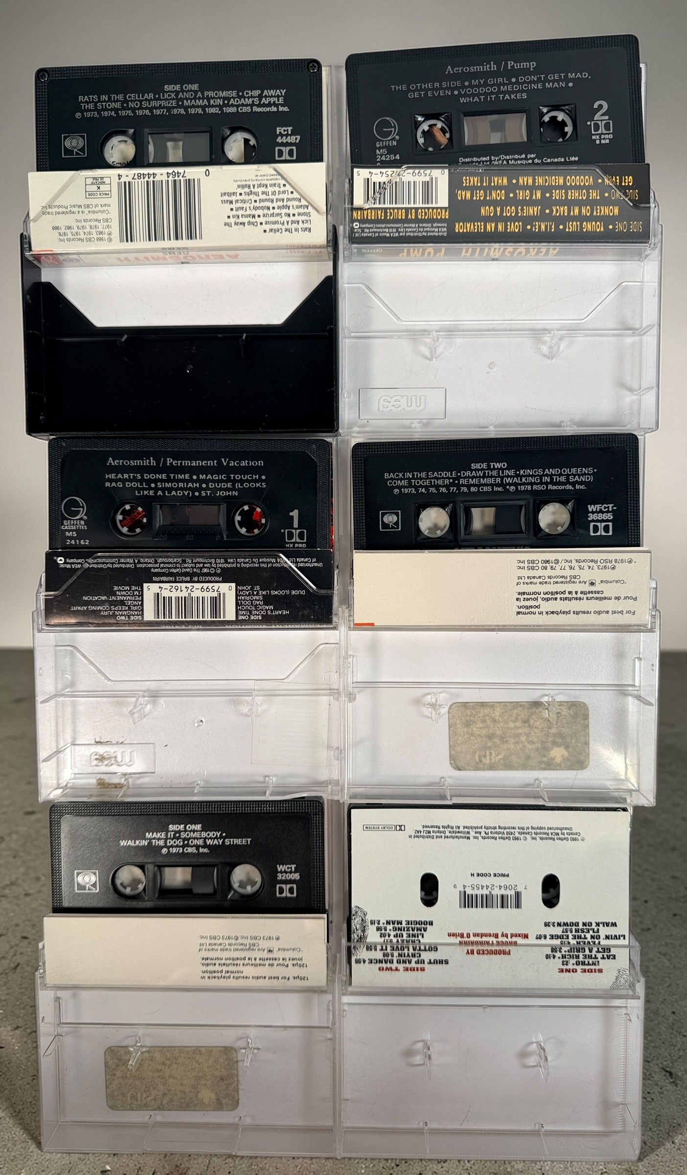 Vintage Aerosmith cassette lot with 6 classic albums including Pump and Get a Grip. Columbia and Geffen releases, perfect for collectors and retro audio setups.