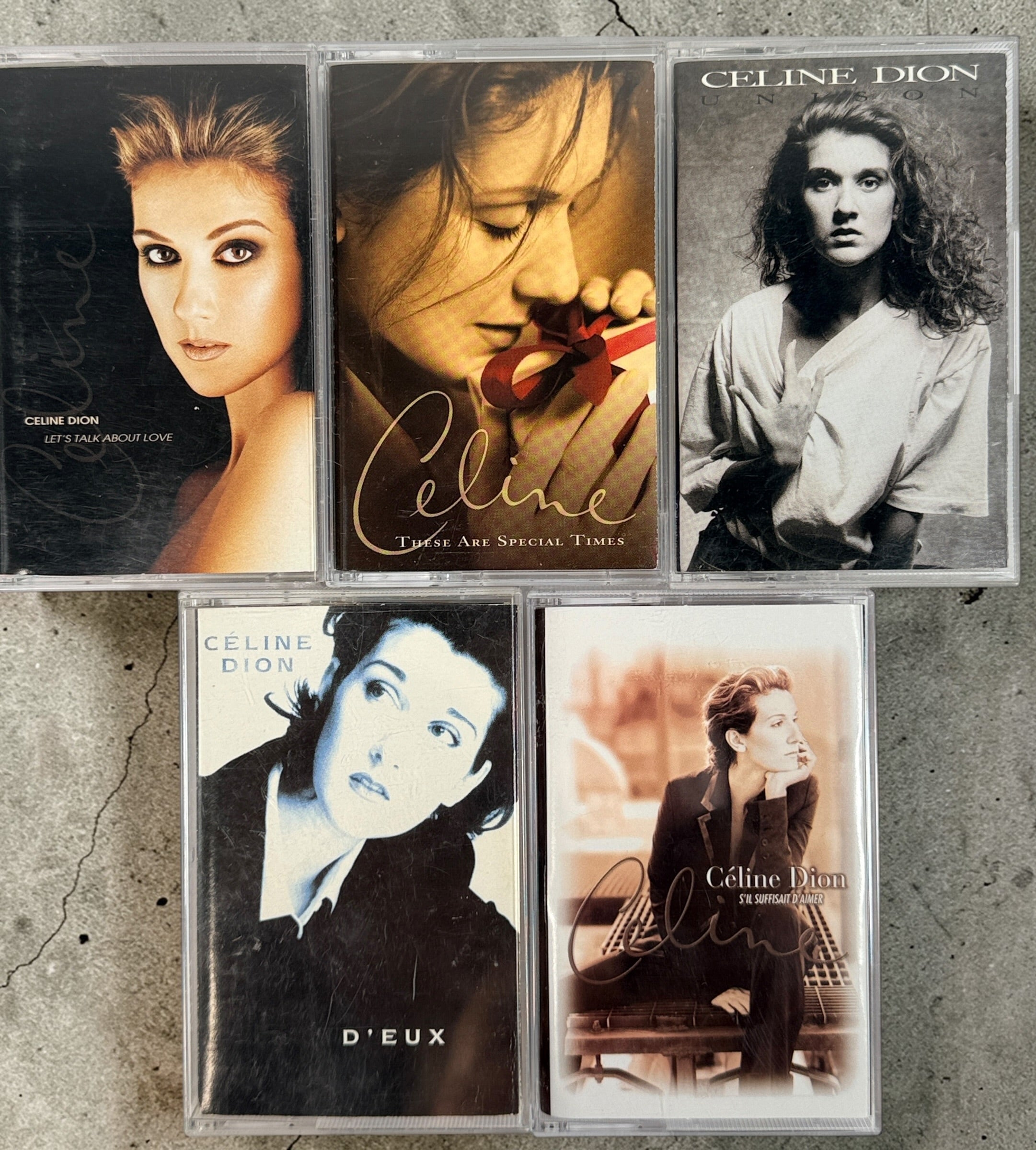 Vintage Celine Dion cassette lot with 5 classic 1990s albums including D’eux and Let’s Talk About Love. Original tapes complete with cases and inserts.