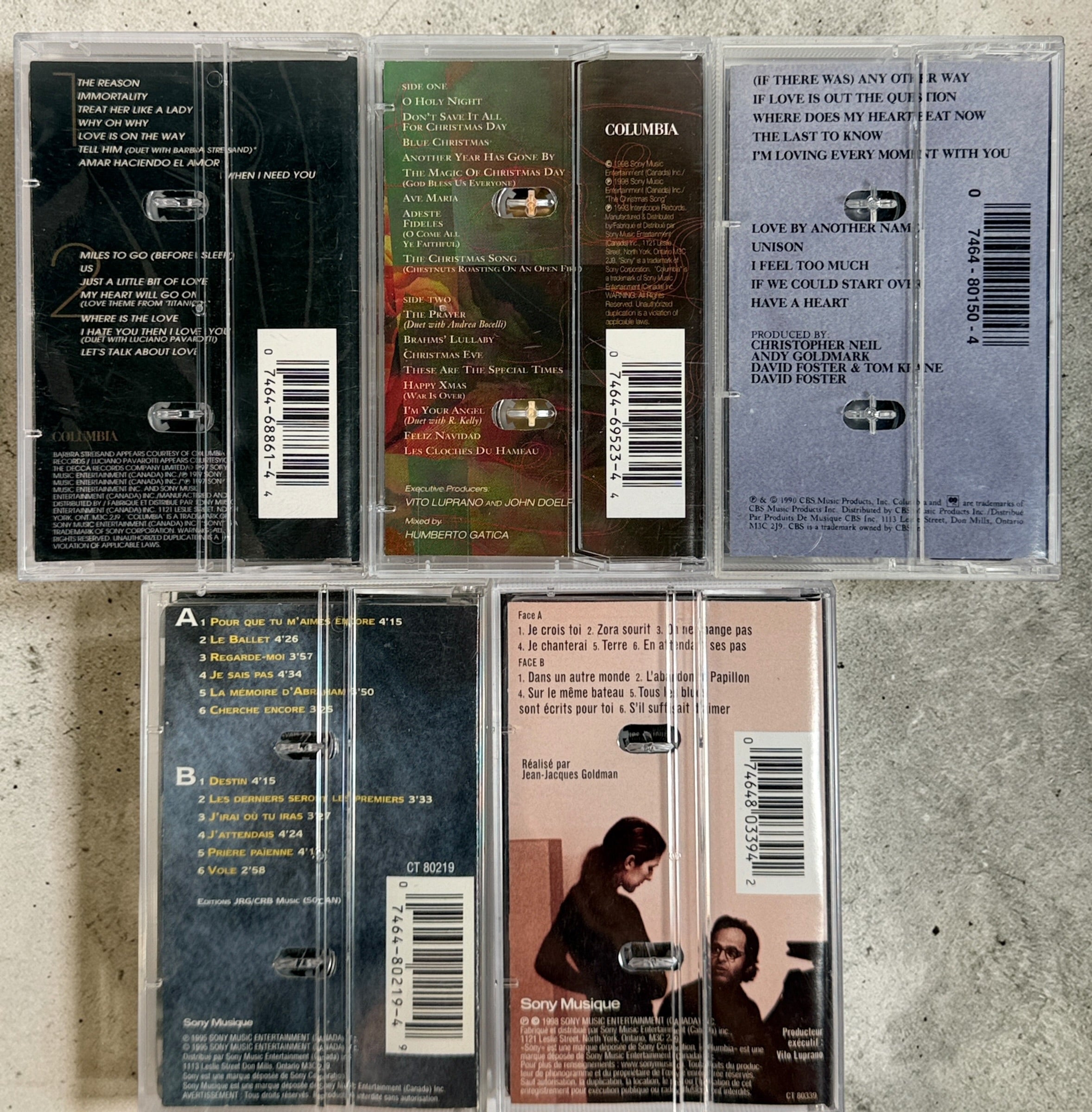 Vintage Celine Dion cassette lot with 5 classic 1990s albums including D’eux and Let’s Talk About Love. Original tapes complete with cases and inserts.