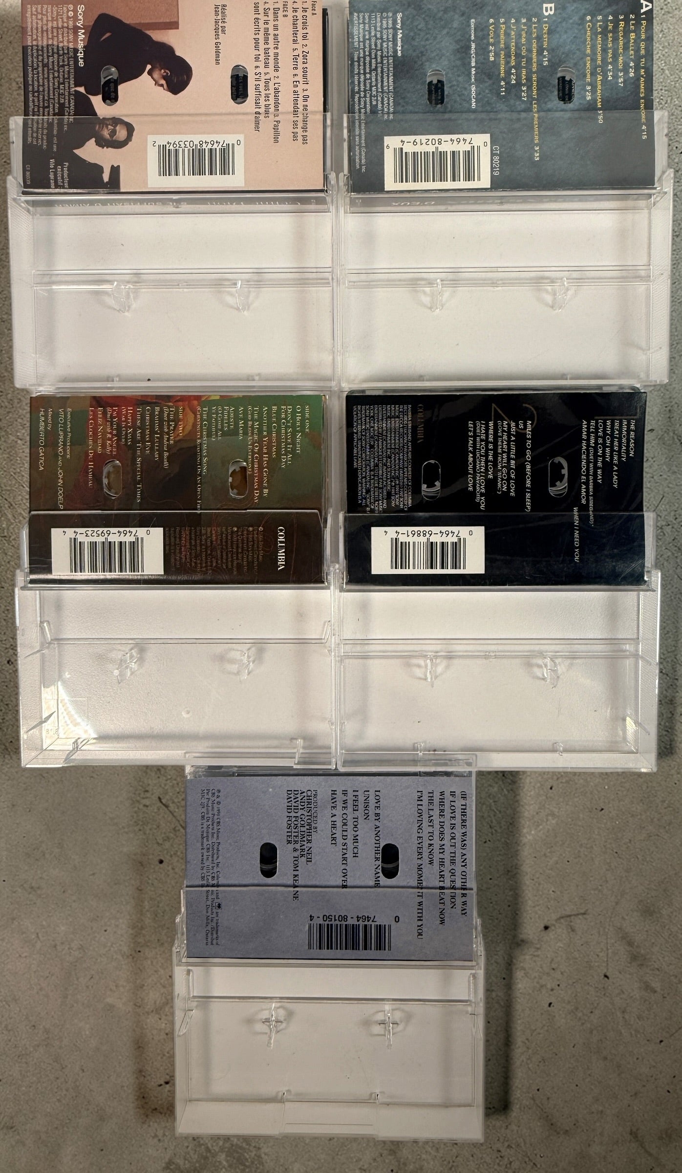 Vintage Celine Dion cassette lot with 5 classic 1990s albums including D’eux and Let’s Talk About Love. Original tapes complete with cases and inserts.