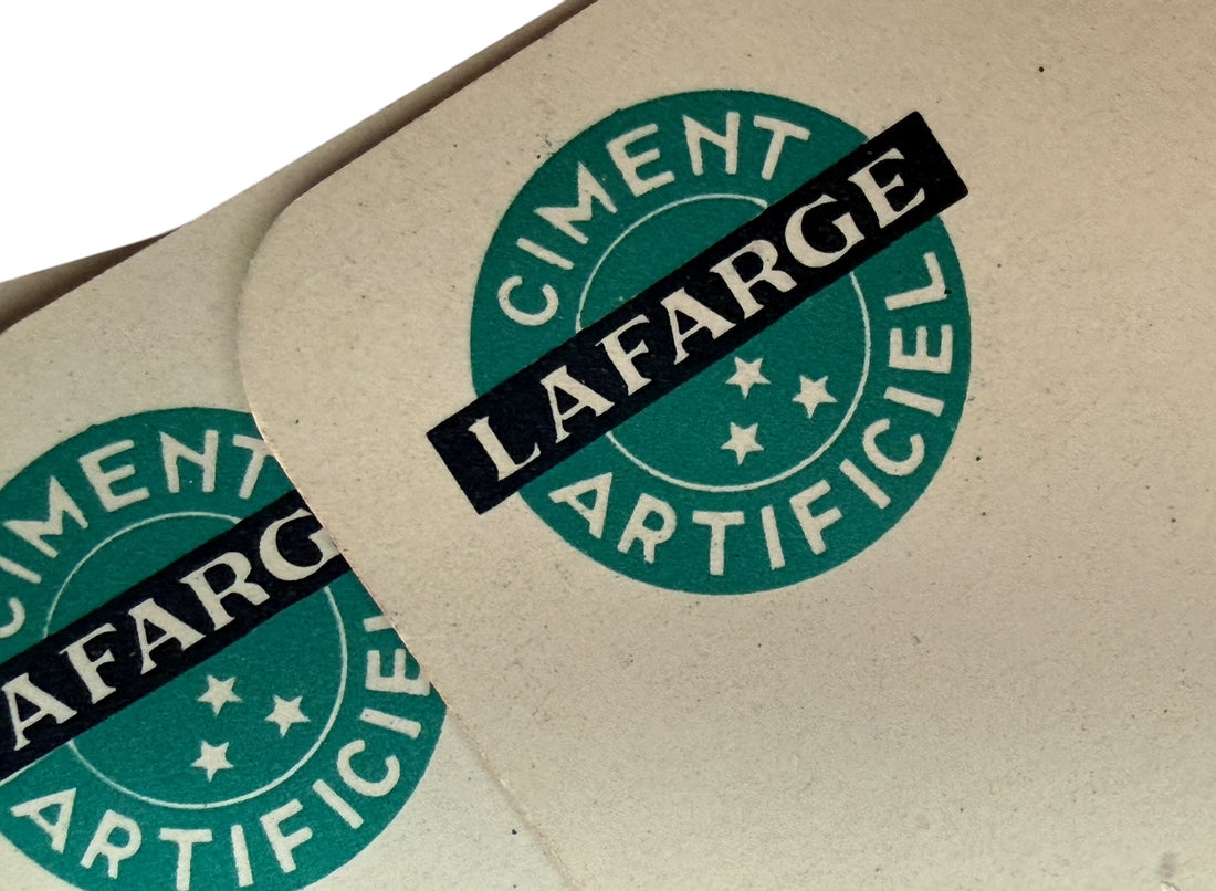 Vintage Lafarge French playing cards advertising deck with joker and original box. Mid-century collectible industrial promo cards in usable condition.