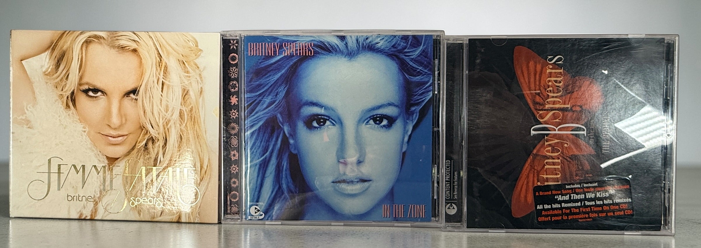 Britney Spears CD lot with Femme Fatale deluxe, In The Zone and remix album. Affordable pop bundle with original packaging and inserts included.
