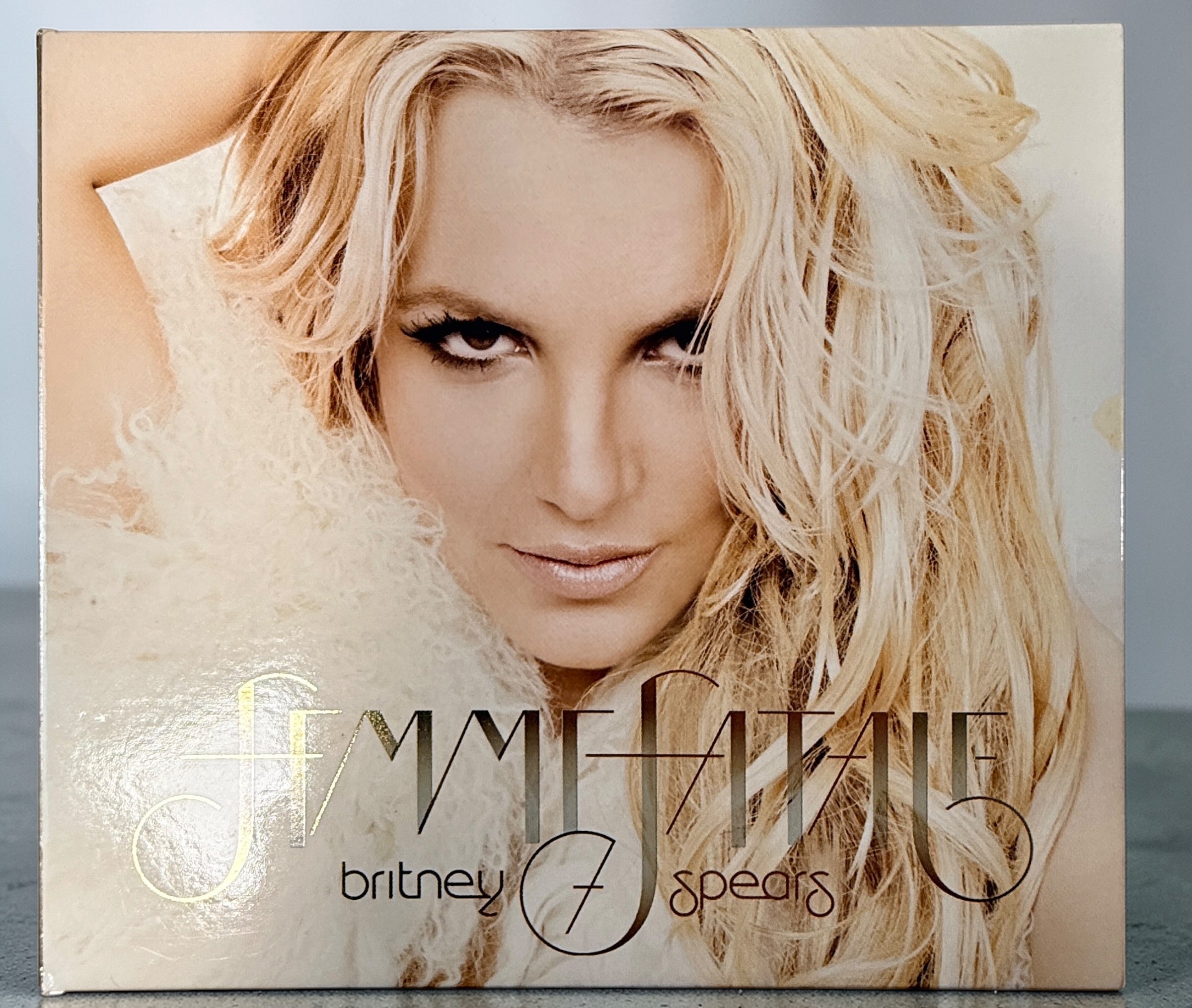 Britney Spears CD lot with Femme Fatale deluxe, In The Zone and remix album. Affordable pop bundle with original packaging and inserts included.