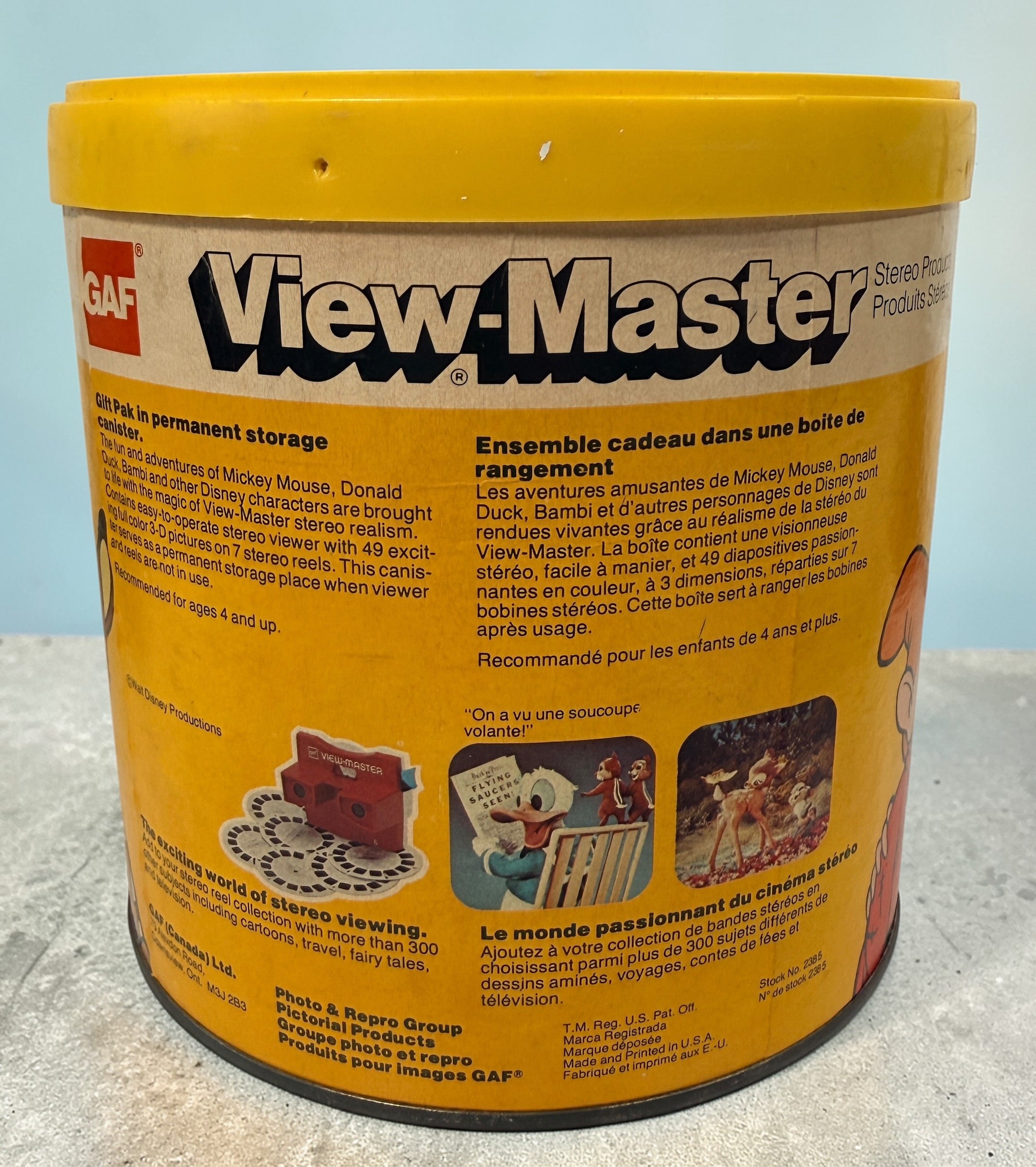 Vintage 1970s GAF View-Master Disney Gift Pak with viewer and reels. Classic 3D toy set with original canister, great collectible condition.